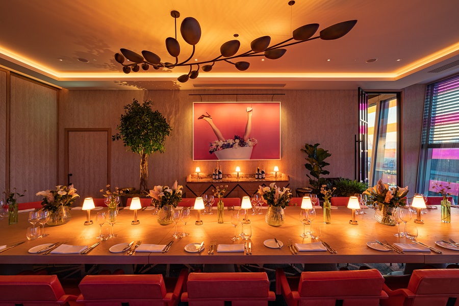 Elegant event space at 14 Hills with floral centerpieces for upscale gatherings.