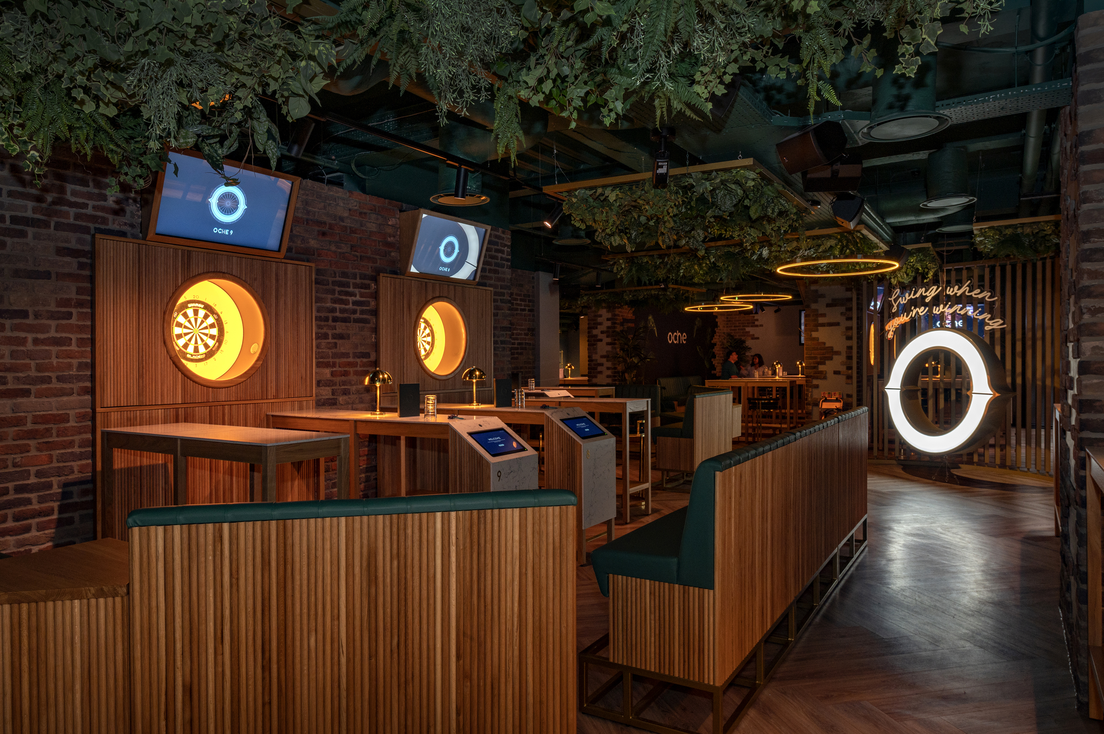 Modern event space with wood accents for team-building and social mixers in Oche The Strand.