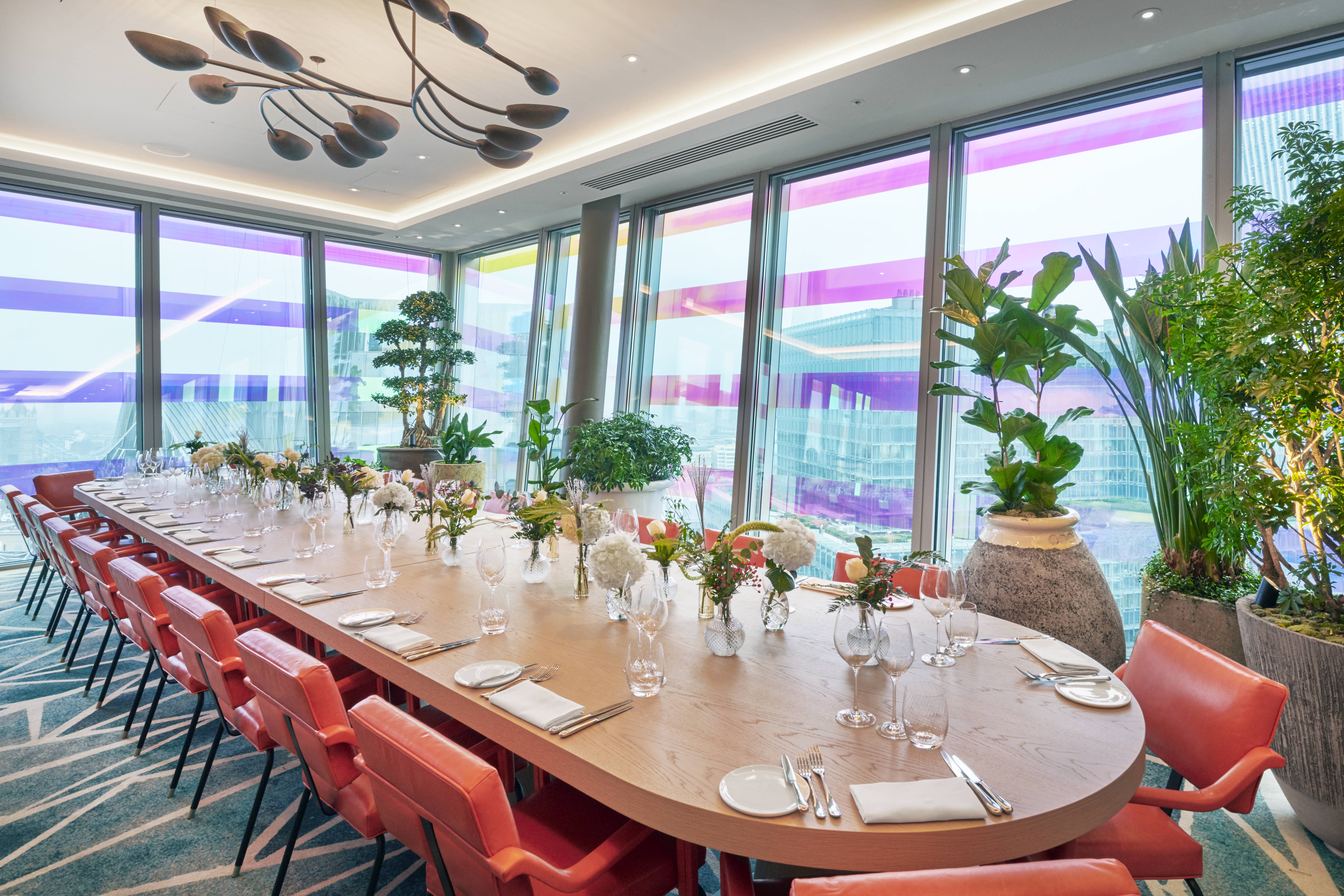 Private dining room with elegant table, ideal for exclusive meetings and events.