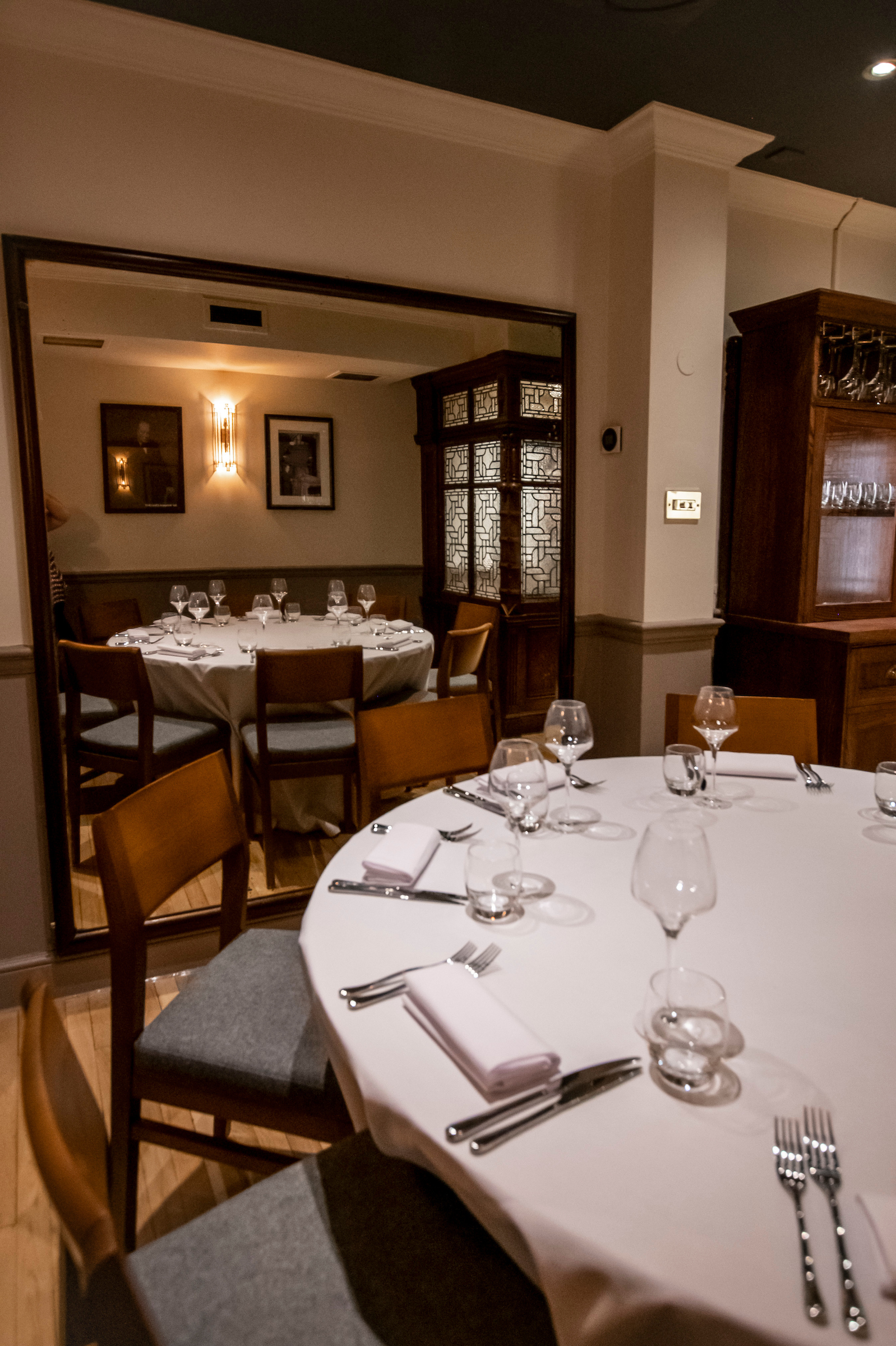 Elegant dining table in Clementine Room, Maddox Tavern for exclusive events and corporate dinners.