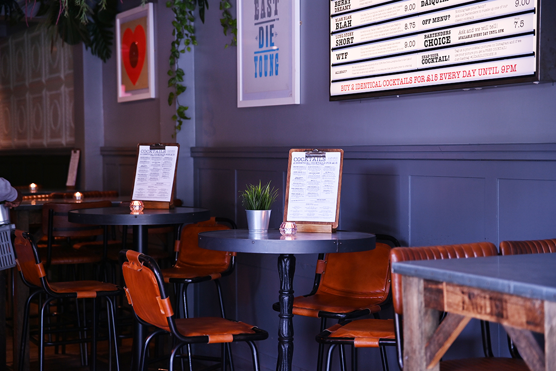 Stylish Lizard Lounge bar area with modern seating for networking events and gatherings.