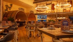 Stylish Tapas Revolution Restaurant with warm lighting, perfect for events and gatherings.