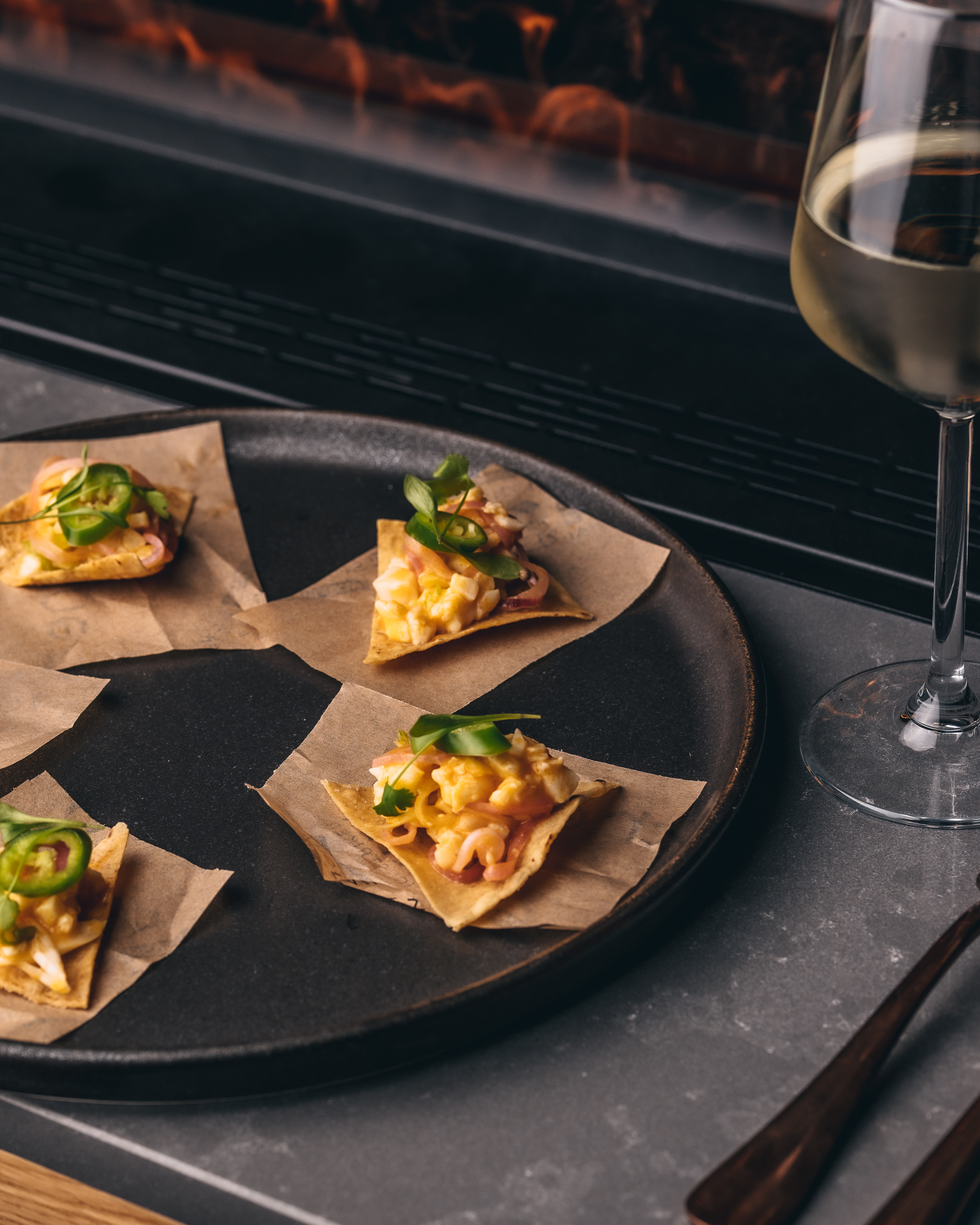 Gourmet appetizers on a platter at Exclusive Venue Hire for upscale events.