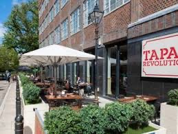 Outdoor dining area at Tapas Revolution Brighton, perfect for casual meetings and networking.