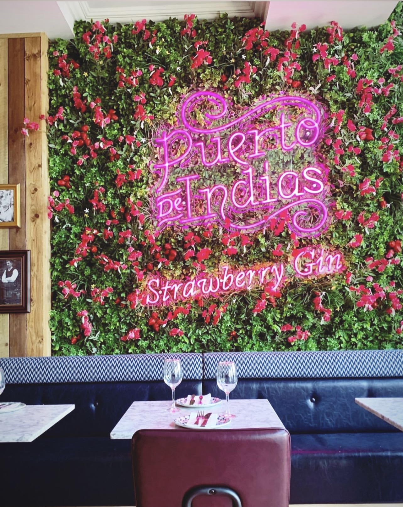 Tapas Revolution Restaurant with floral wall, ideal for cocktail receptions and events.