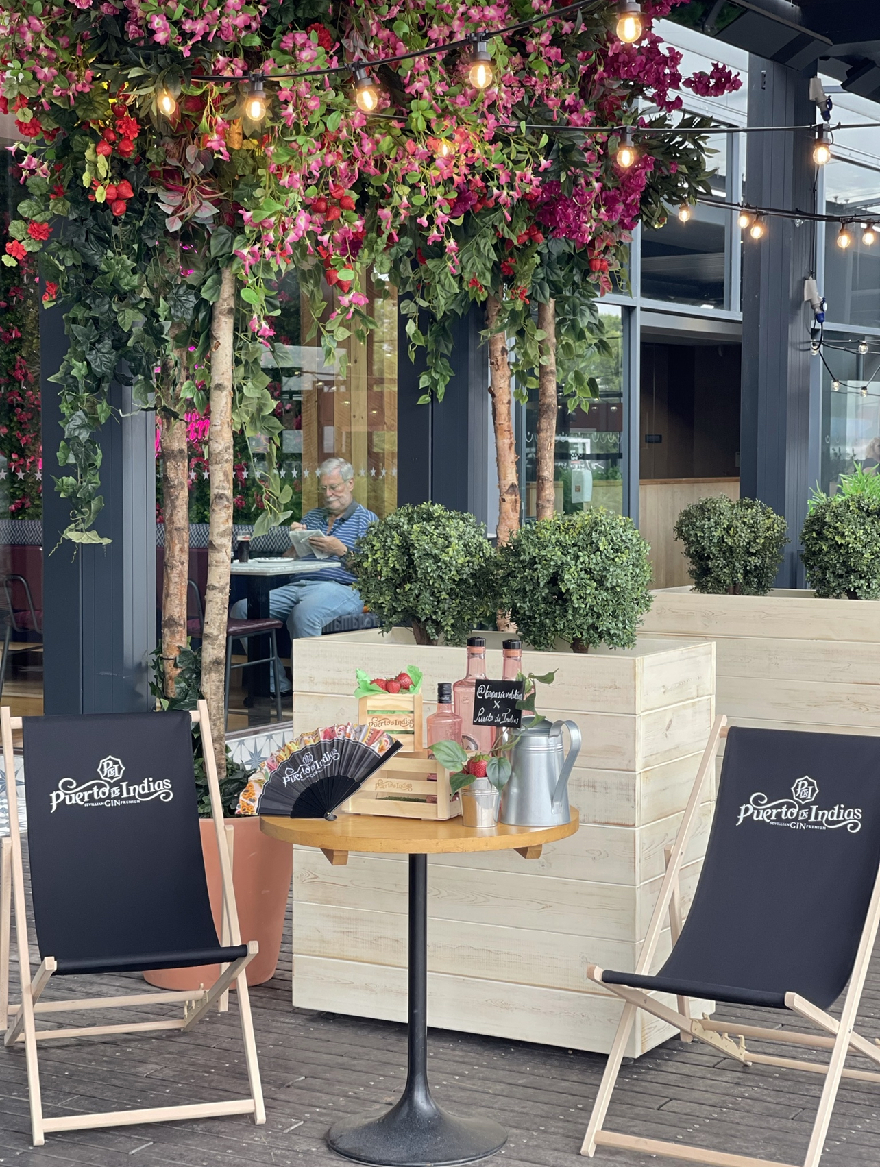 Tapas Revolution Lakeside outdoor event space with stylish seating for casual gatherings.