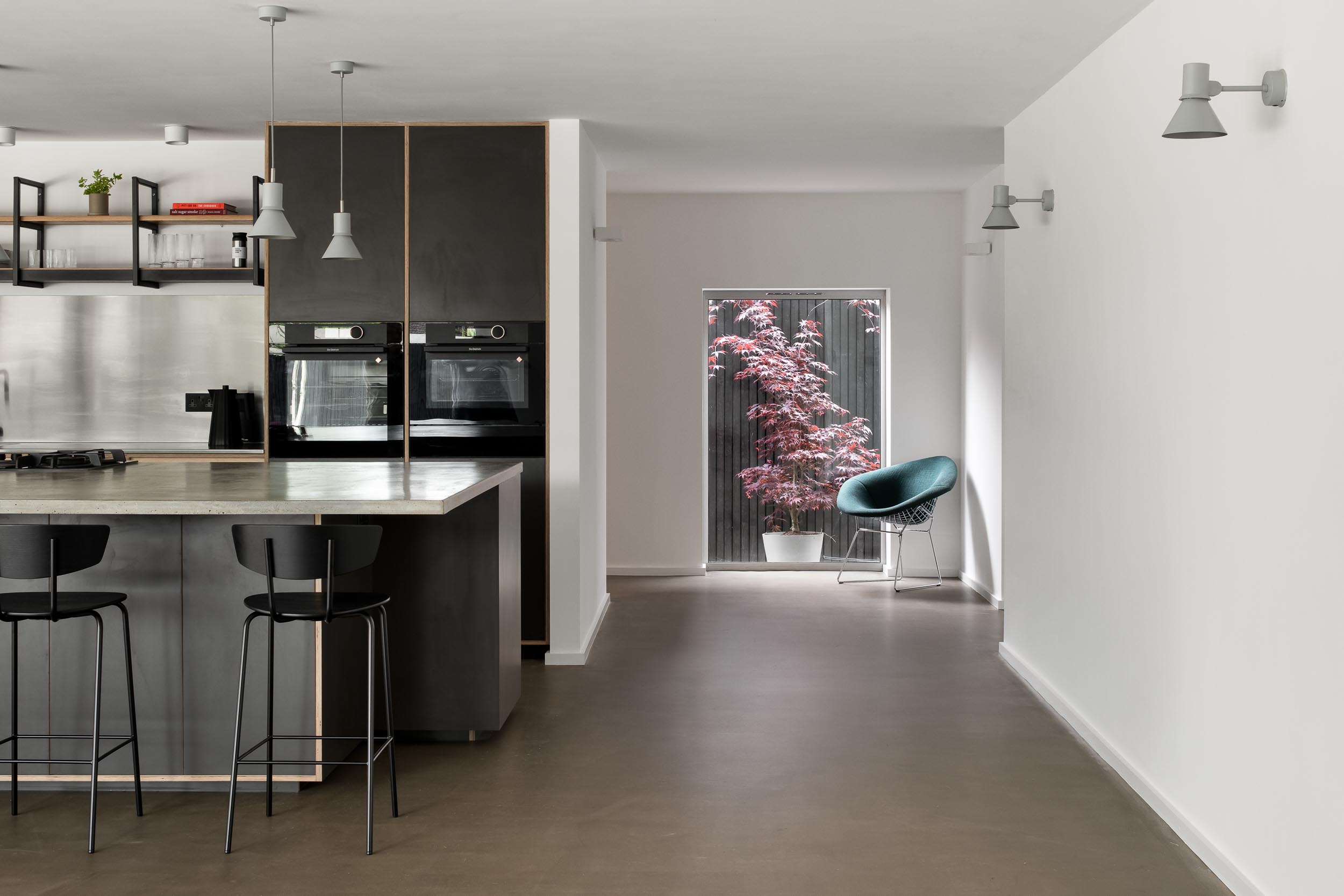 Modern minimalist space in KuroKoti for intimate gatherings and brainstorming sessions.