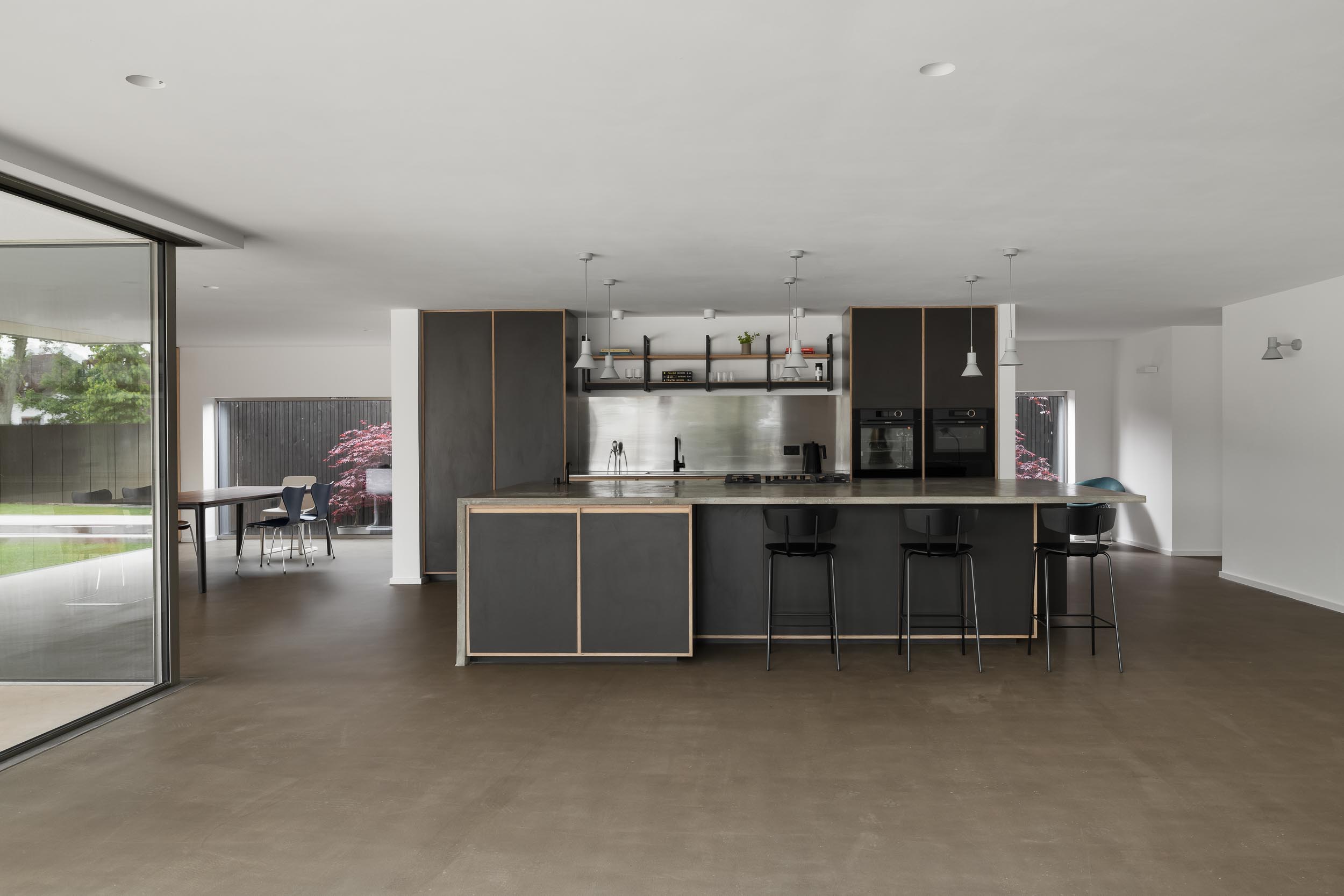 Modern open-concept kitchen in KuroKoti, ideal for culinary events and gatherings.
