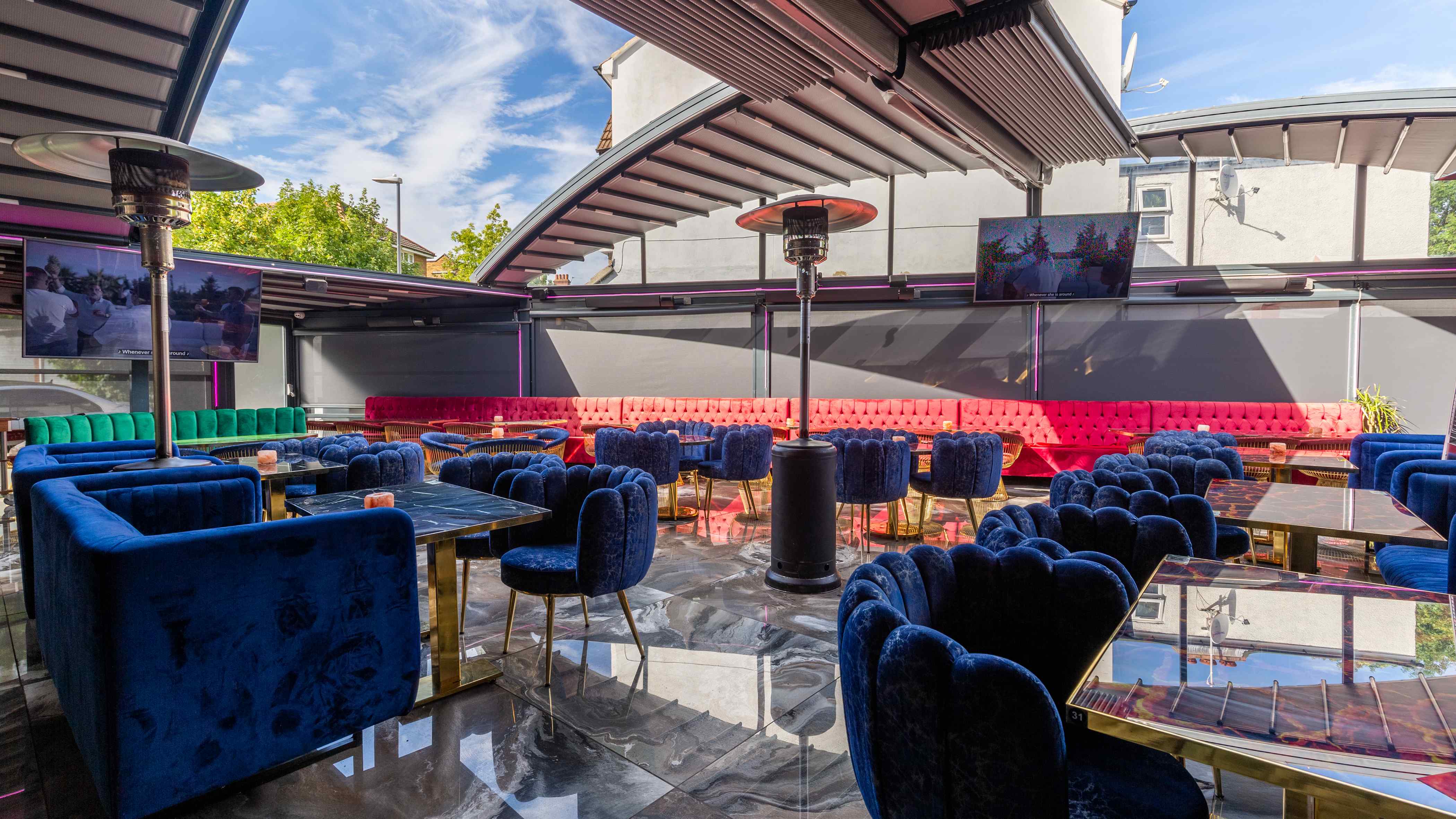 Stylish Vogue Lounge event space with plush seating, perfect for gatherings and corporate events.
