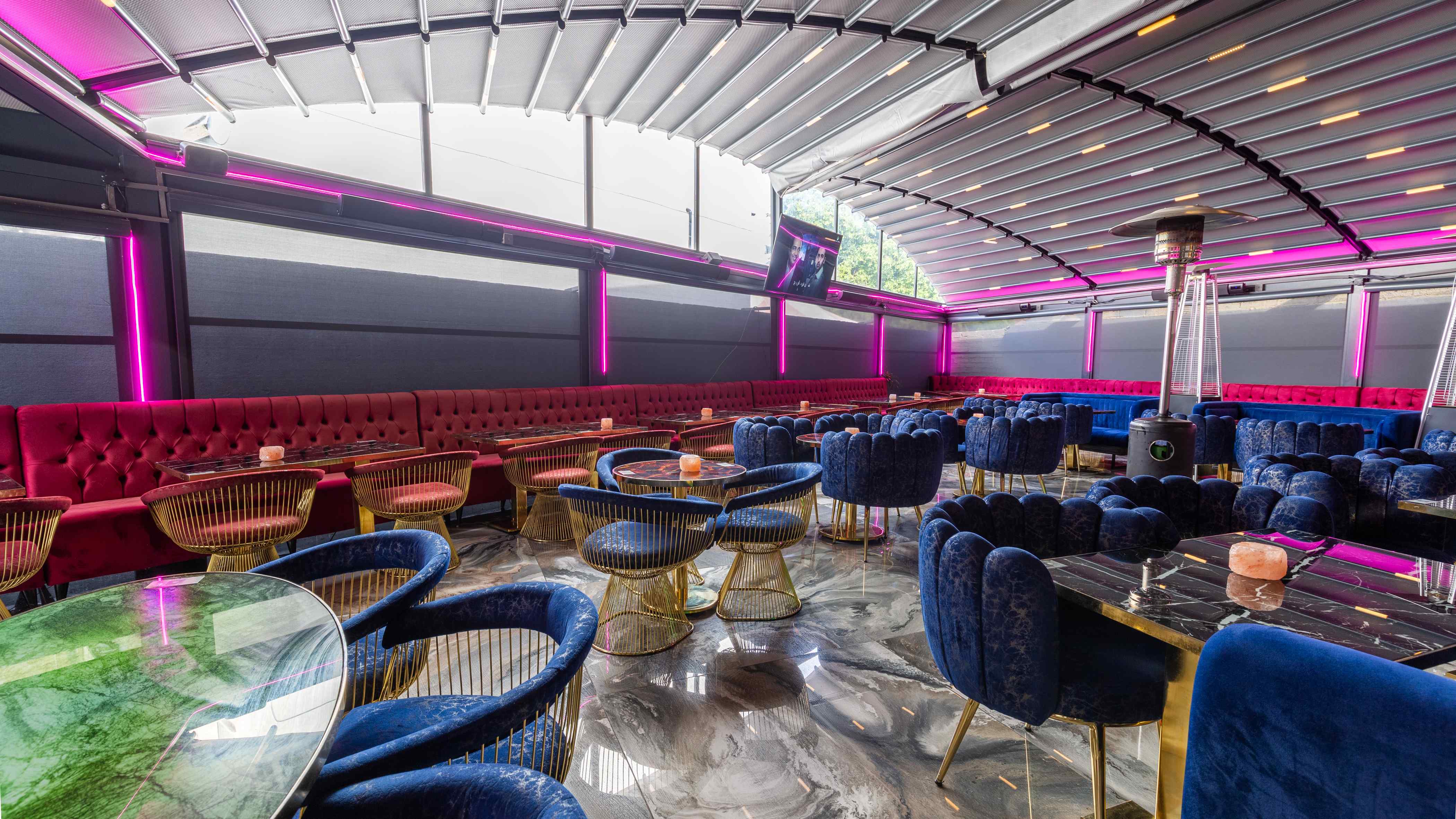 Stylish Vogue Lounge event space with plush seating, ideal for gatherings and corporate events.