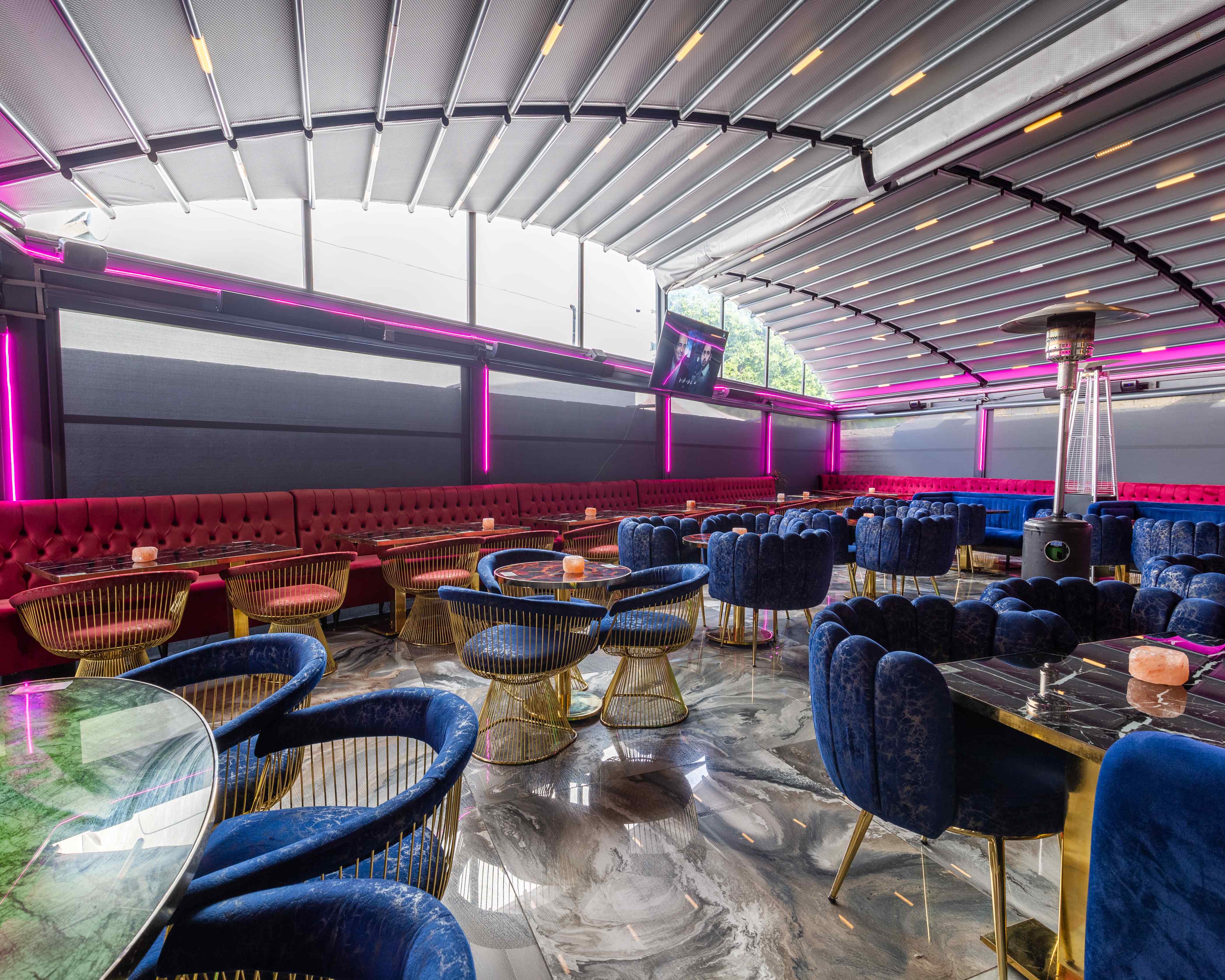 Stylish Vogue Lounge event space with plush seating, ideal for networking and social gatherings.
