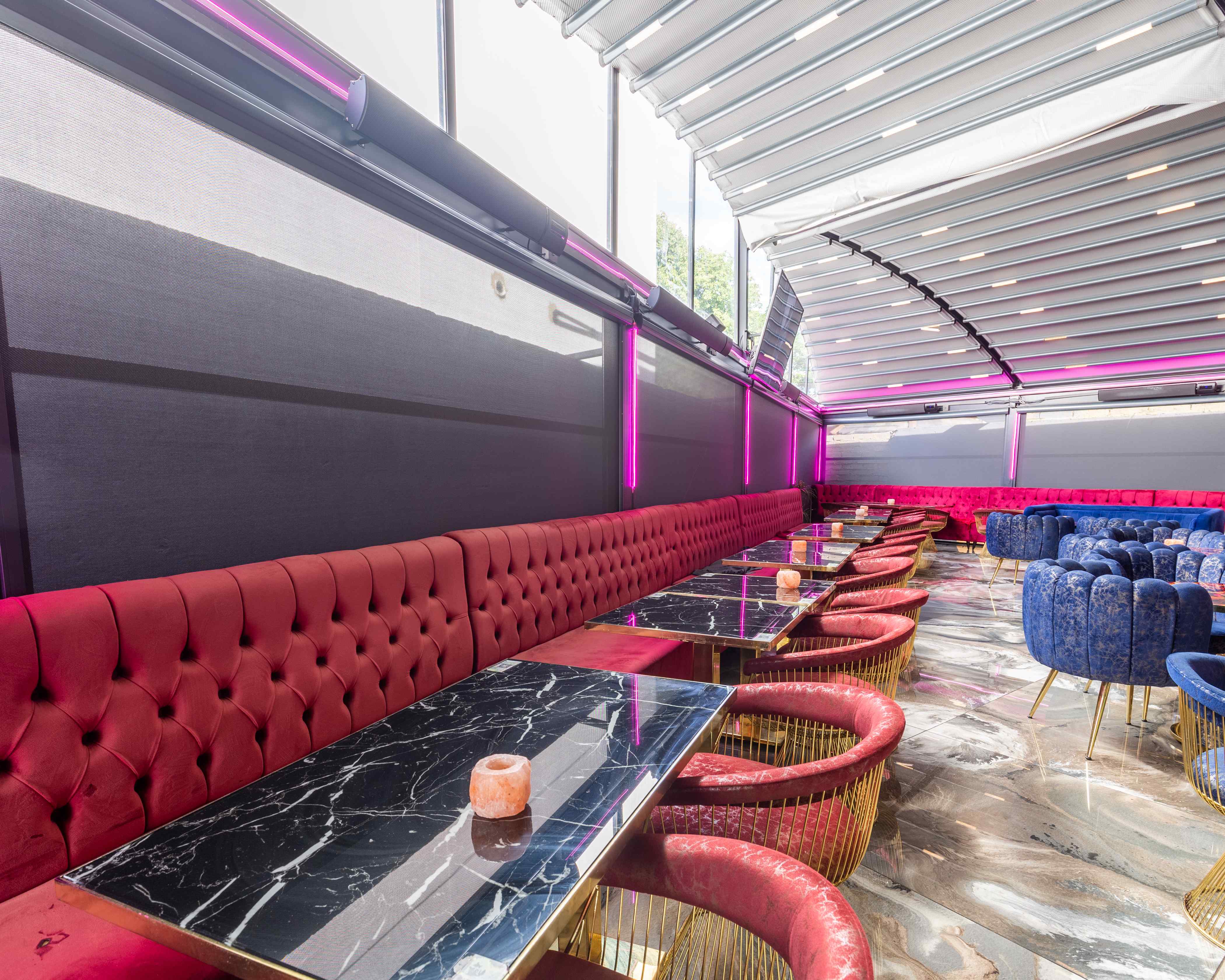 Stylish Vogue Lounge event space with plush seating, ideal for cocktail receptions.