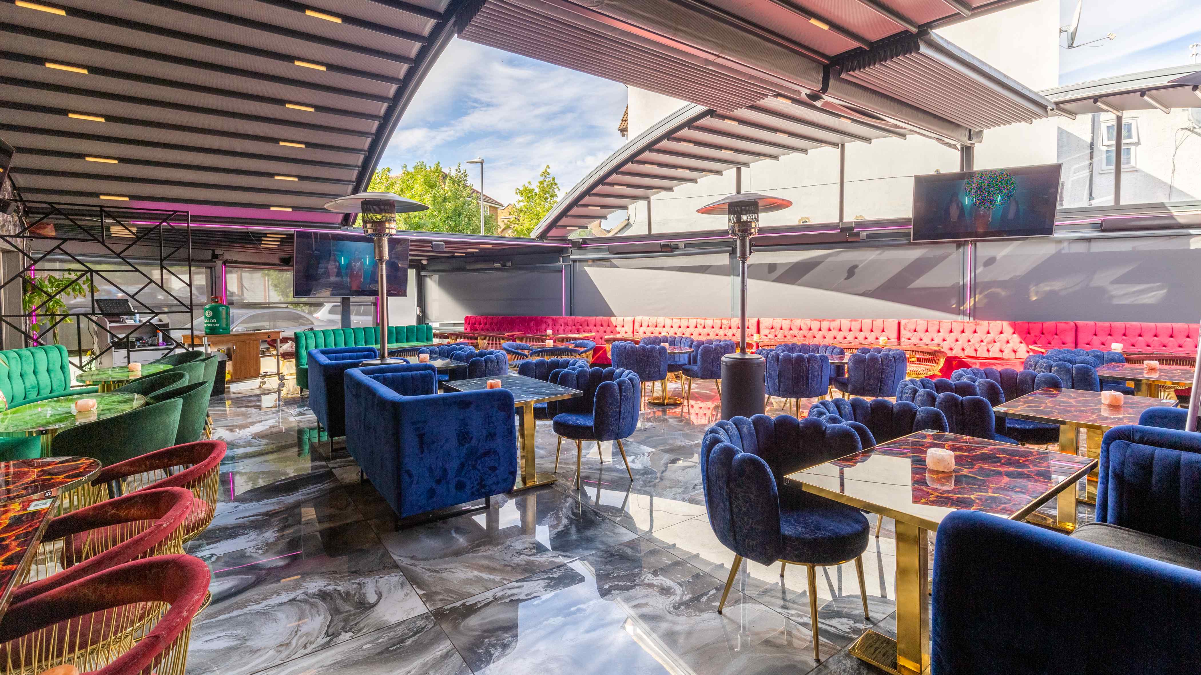 Stylish Vogue Lounge event space with plush seating, ideal for networking and social events.