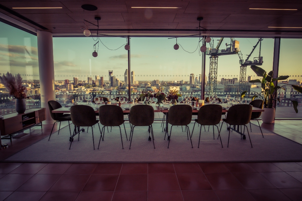 Private dining room with skyline views, ideal for corporate events and meetings.