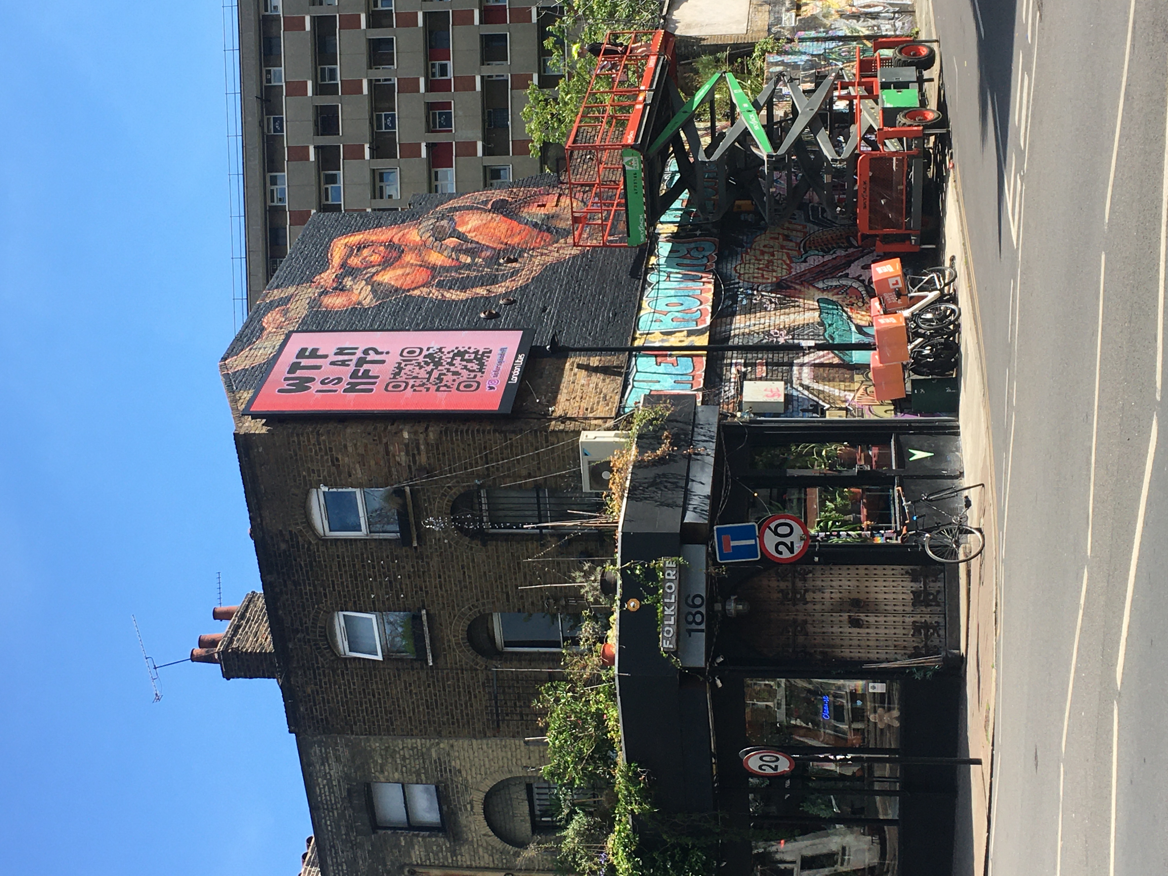 Vibrant Folklore venue with mural, perfect for creative events and gatherings.