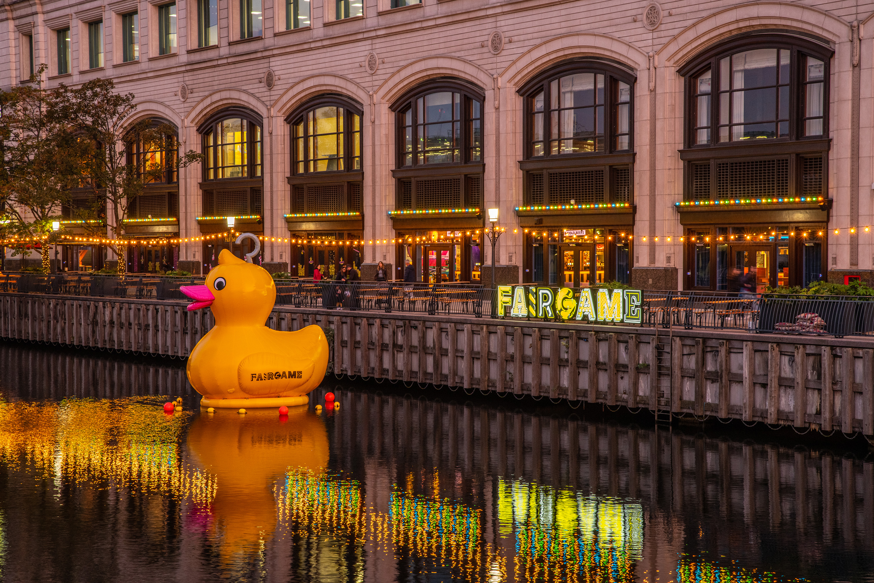 Vibrant outdoor event space with whimsical inflatable duck for family-friendly gatherings.
