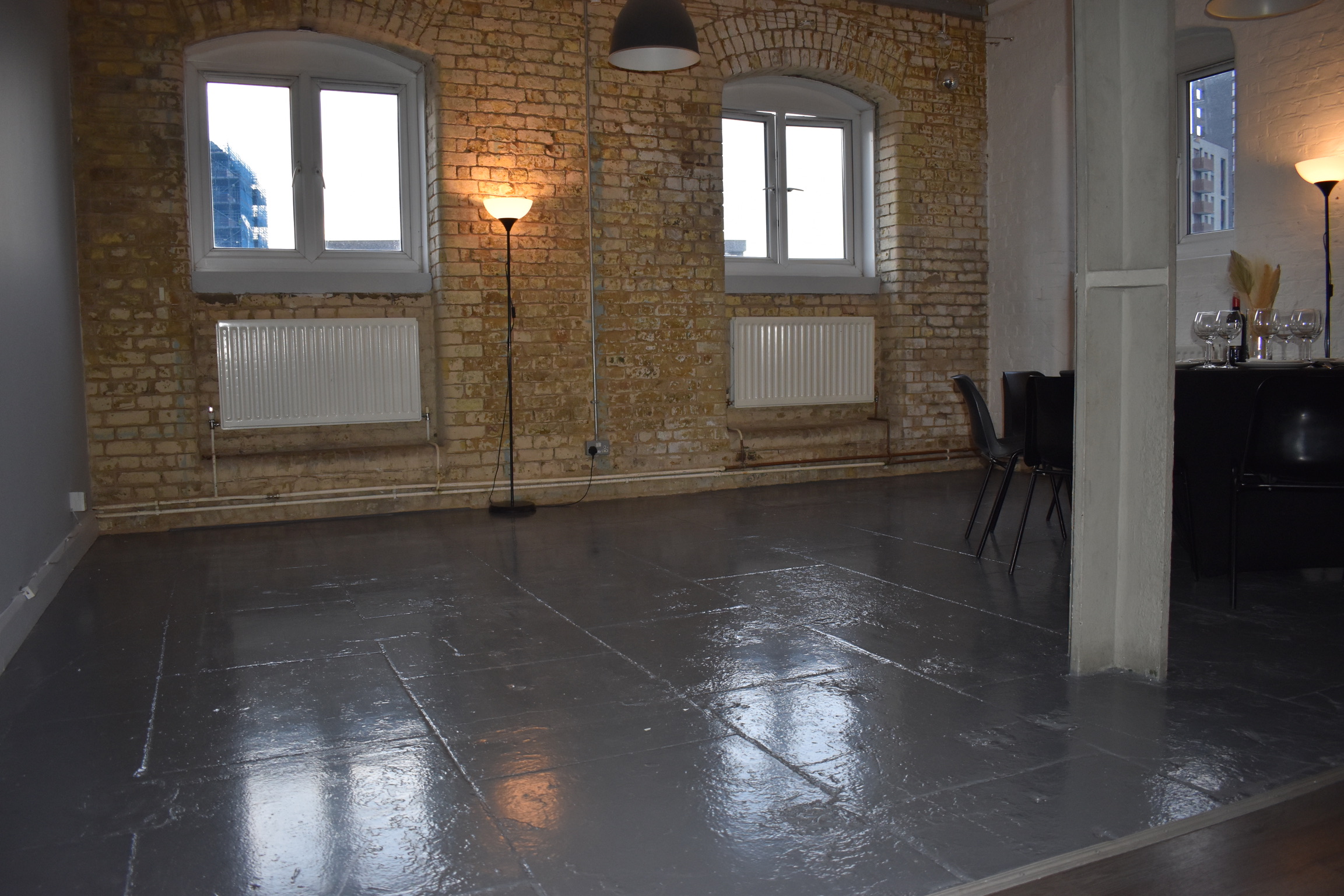 Versatile event space with exposed brick walls at The Randells Room, Boathouse Studios.