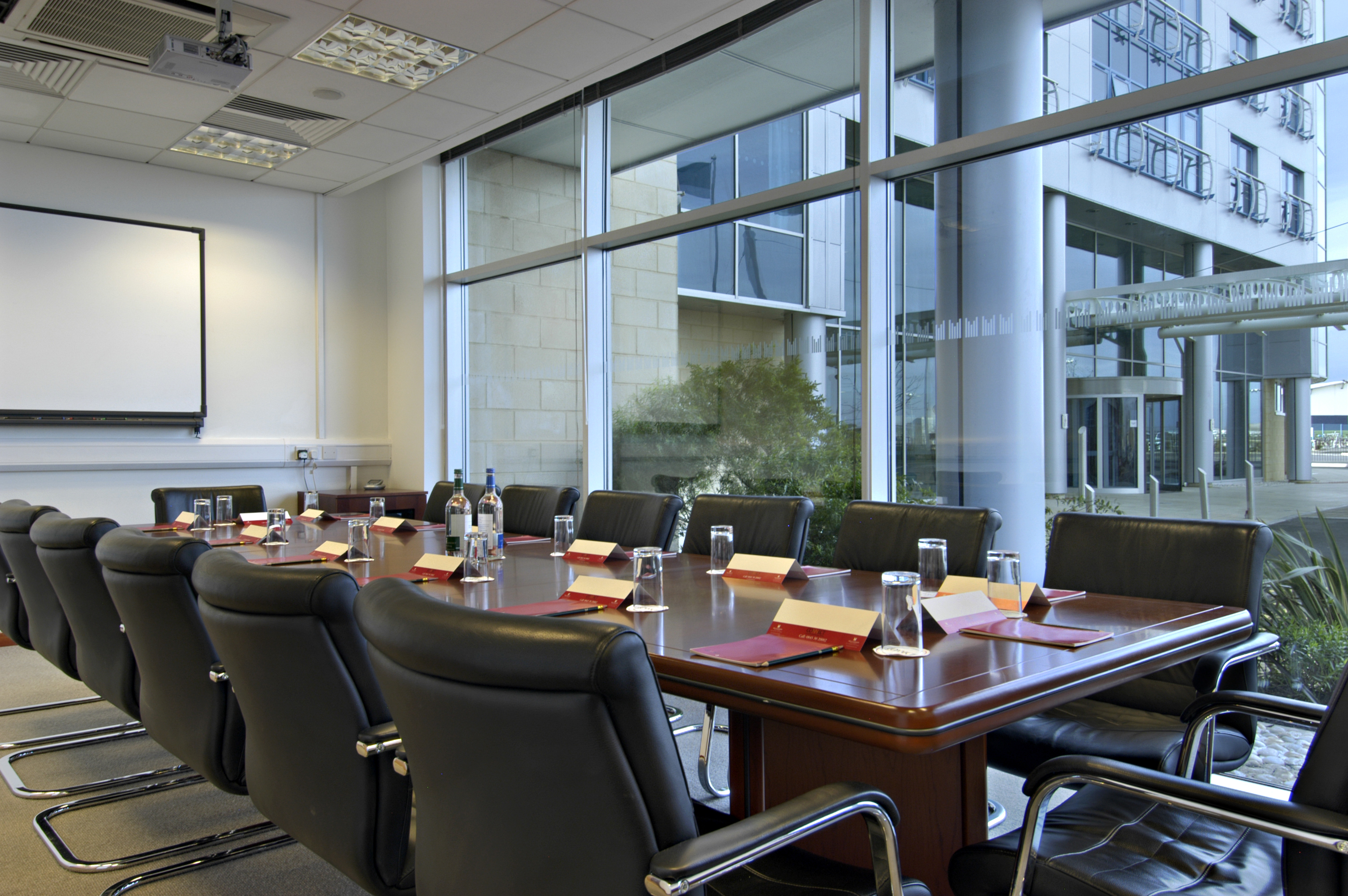 Madejski Suite conference room with large table, perfect for corporate events and meetings.
