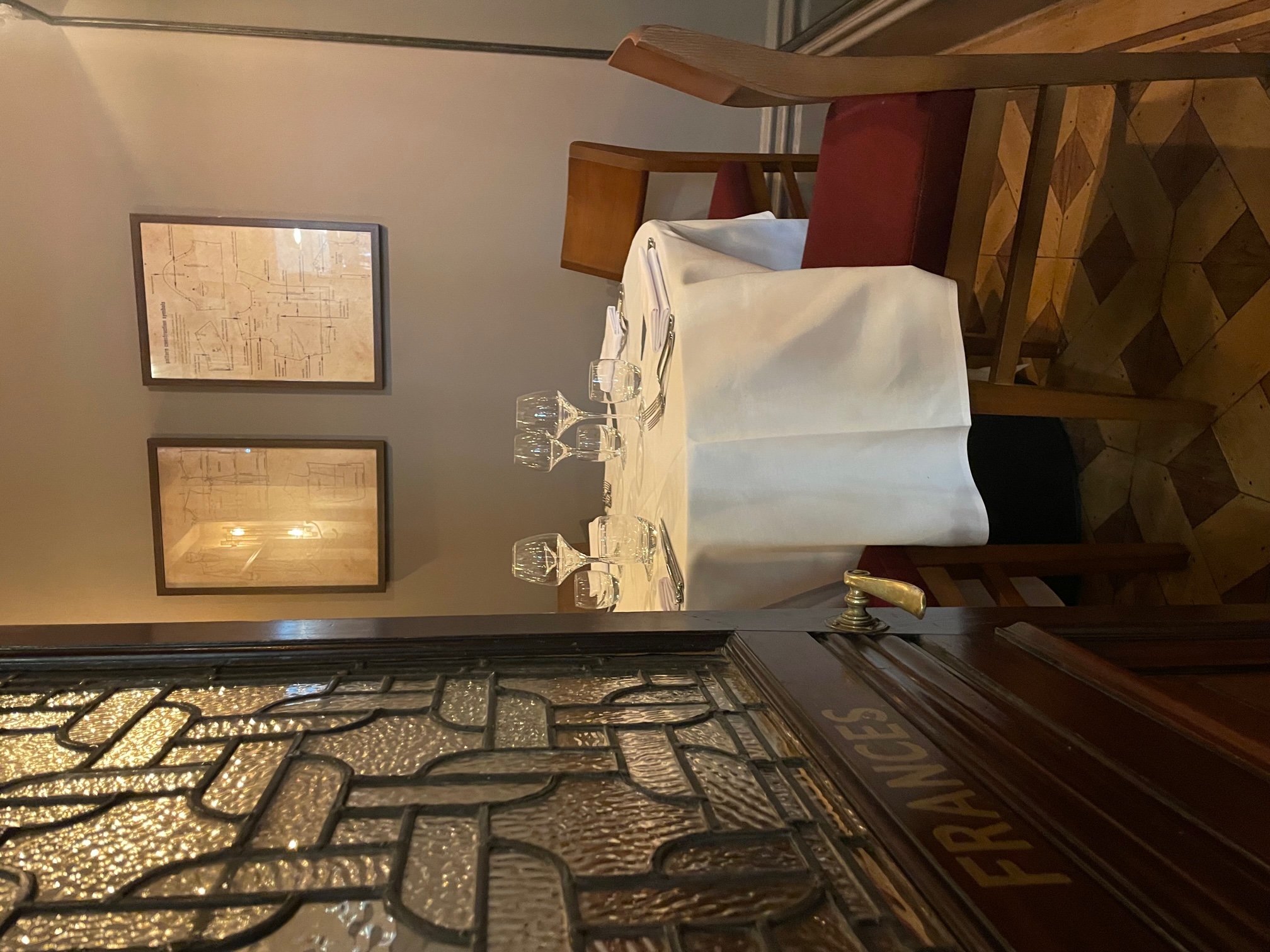 Intimate dining setup in Frances Room, Maddox Tavern for corporate events and gatherings.