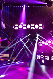 Dynamic event space in Circuit Cardiff with vibrant lighting for corporate events.