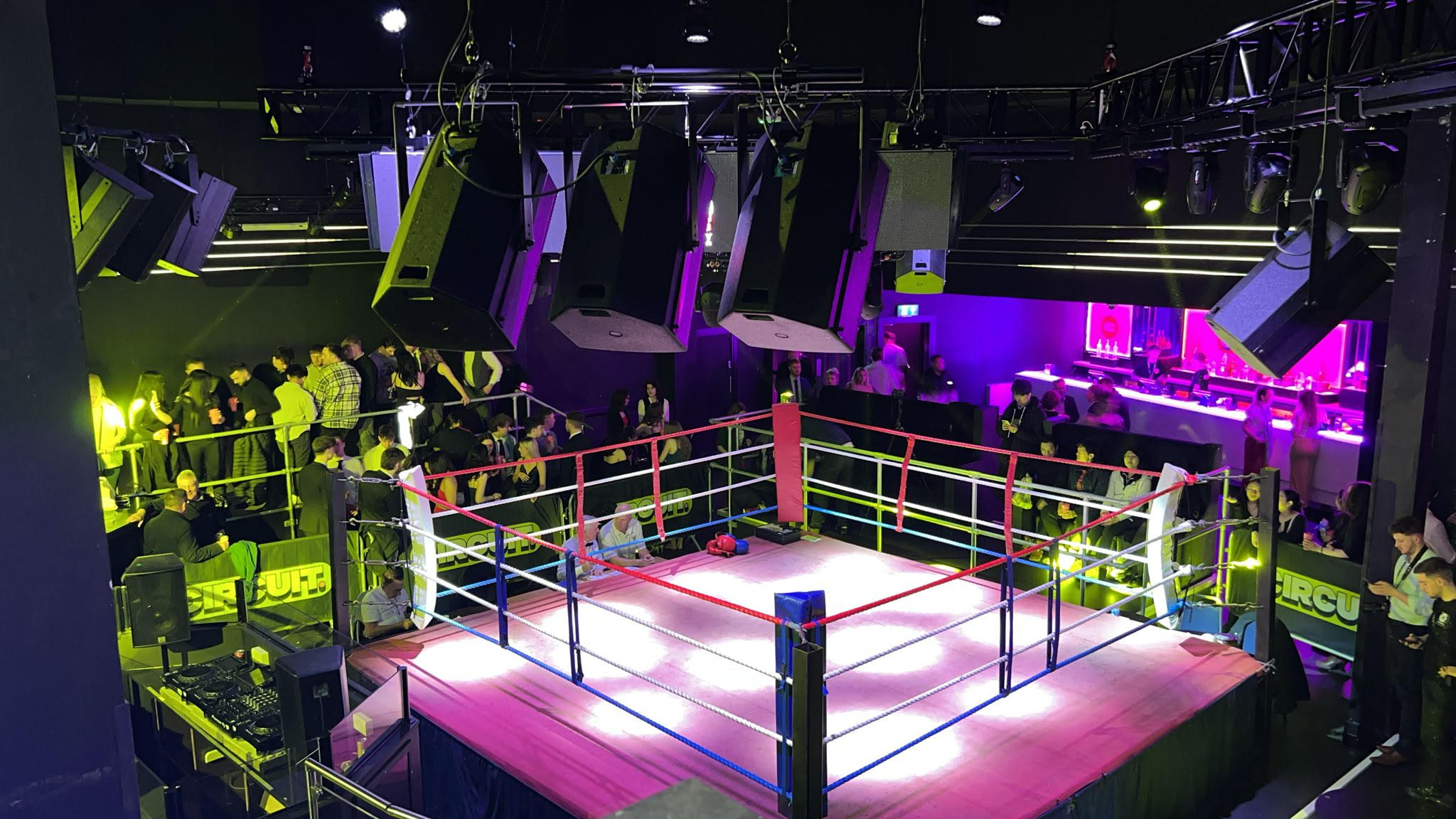 Dynamic event space with boxing ring, perfect for corporate team-building and themed parties.