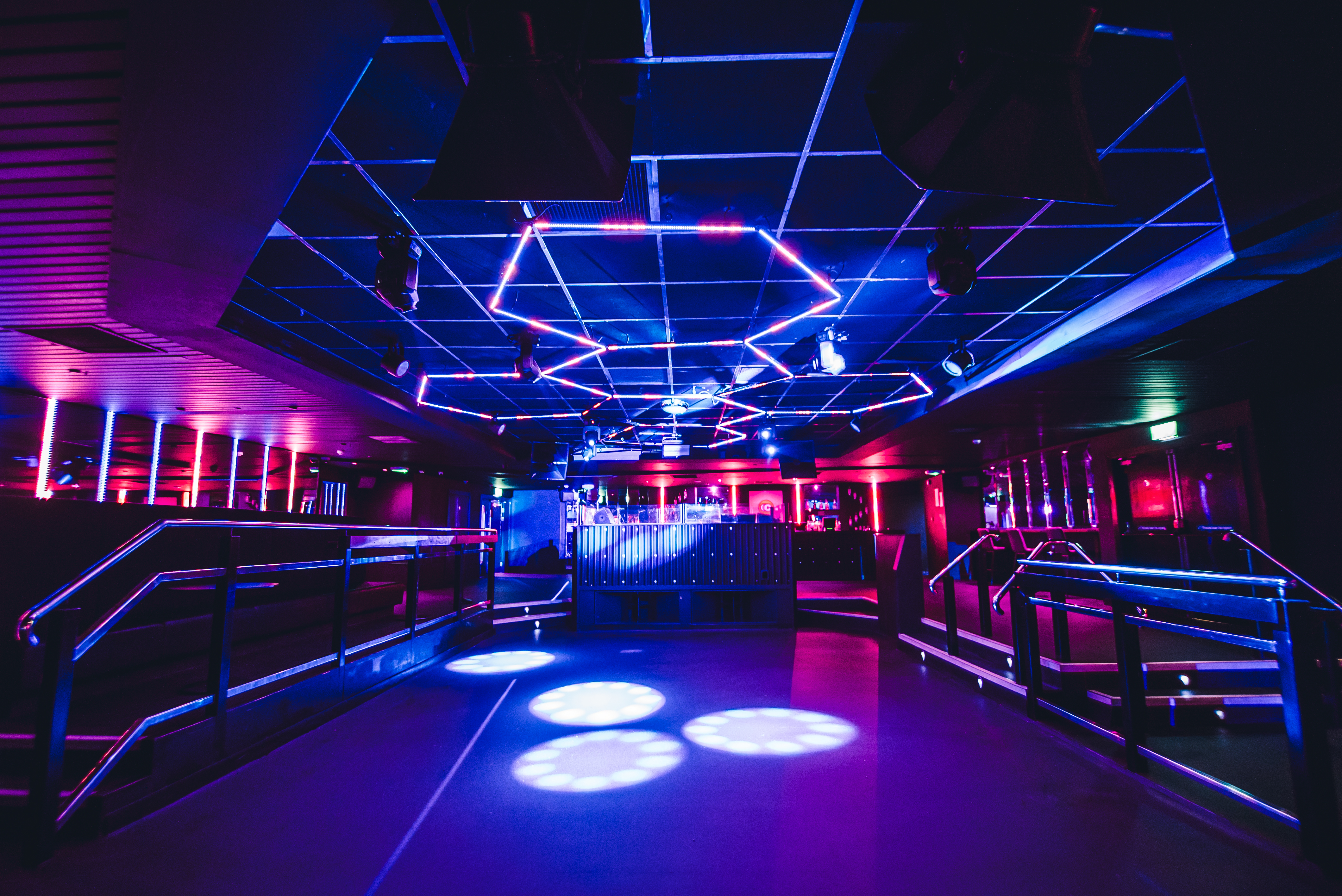 Vibrant event space in Circuit Cardiff with dynamic lighting for corporate gatherings.