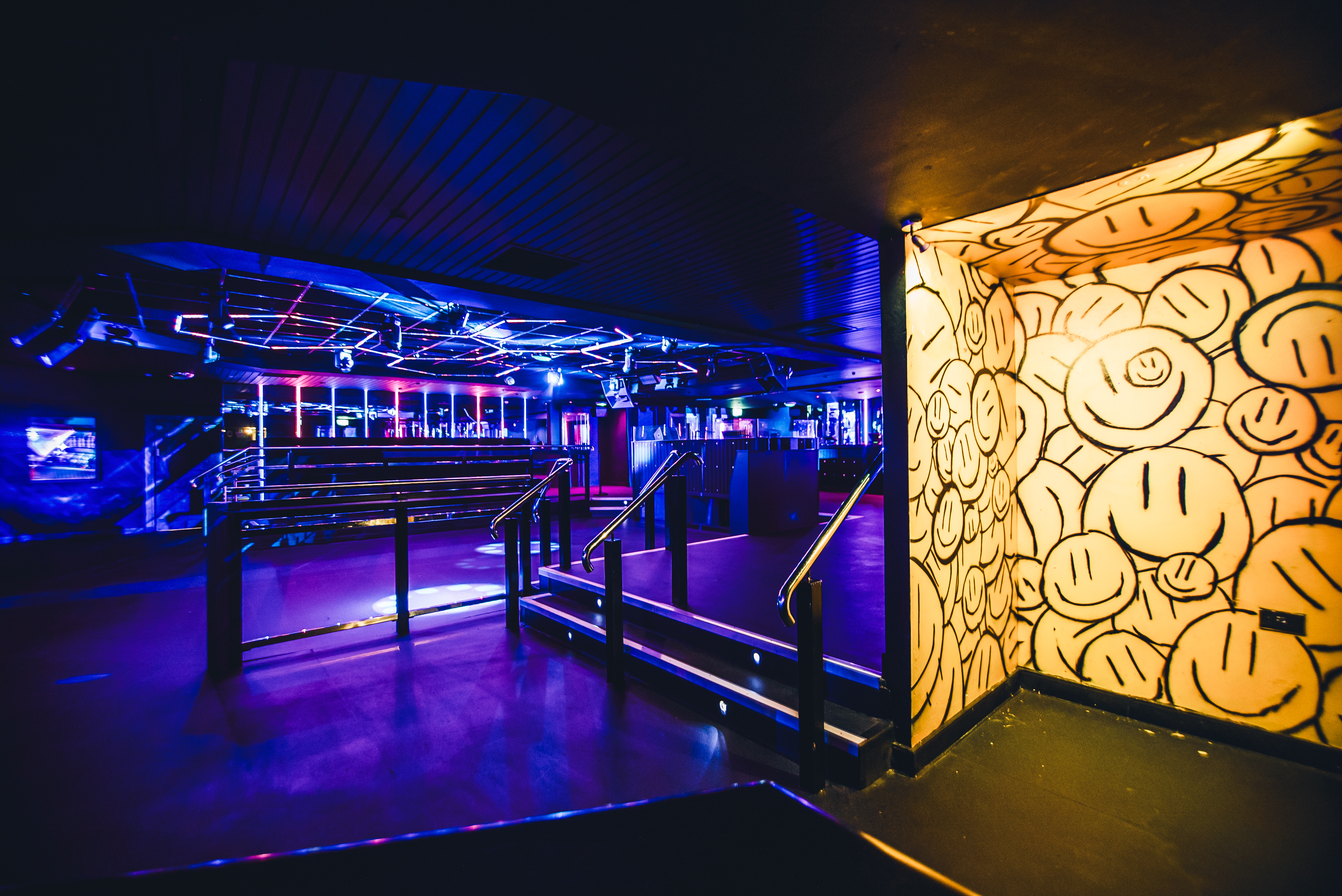Vibrant event space in Circuit Cardiff with dynamic lighting for lively gatherings.