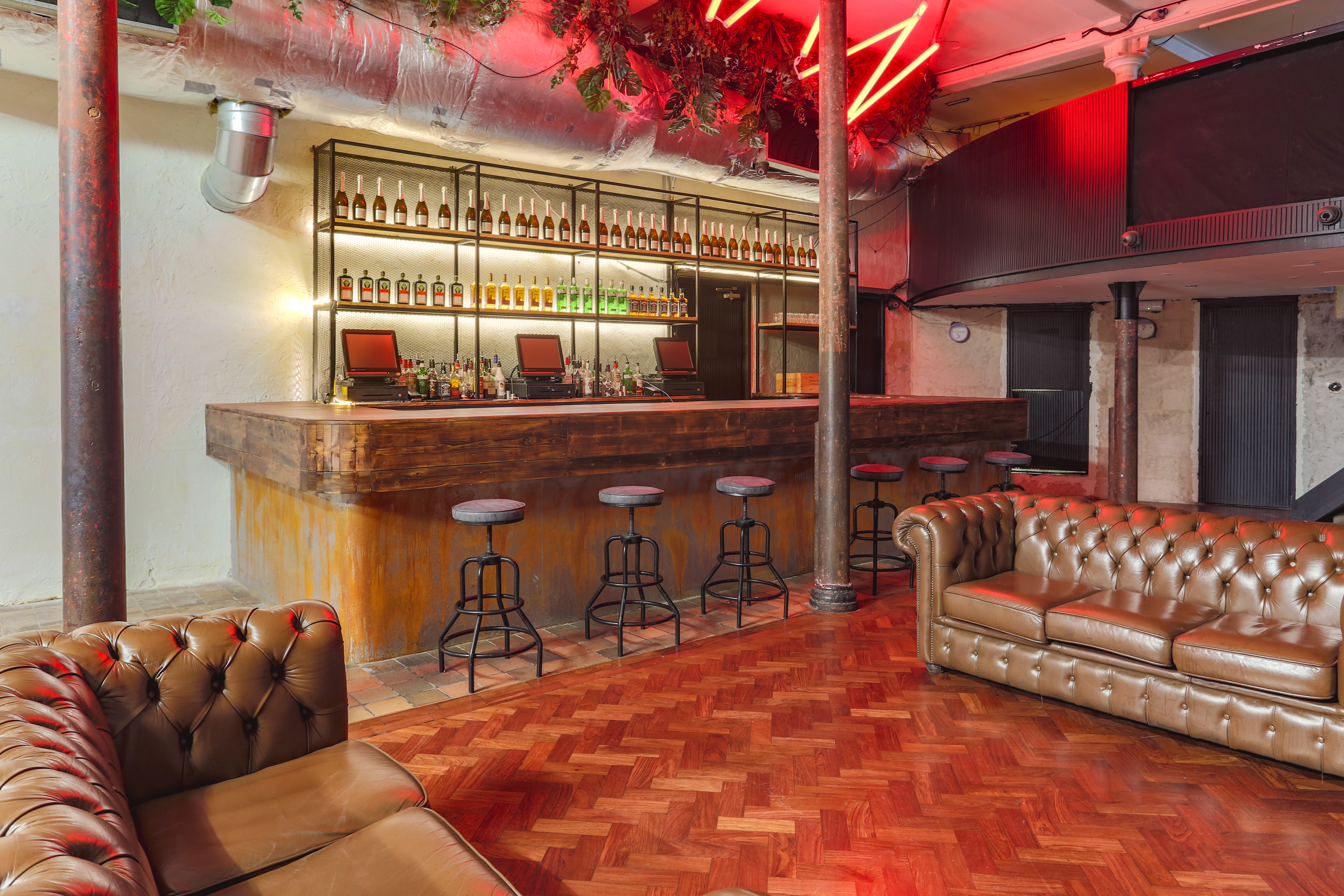 Stylish bar area in Live Room at 93 Feet East, ideal for networking events and gatherings.