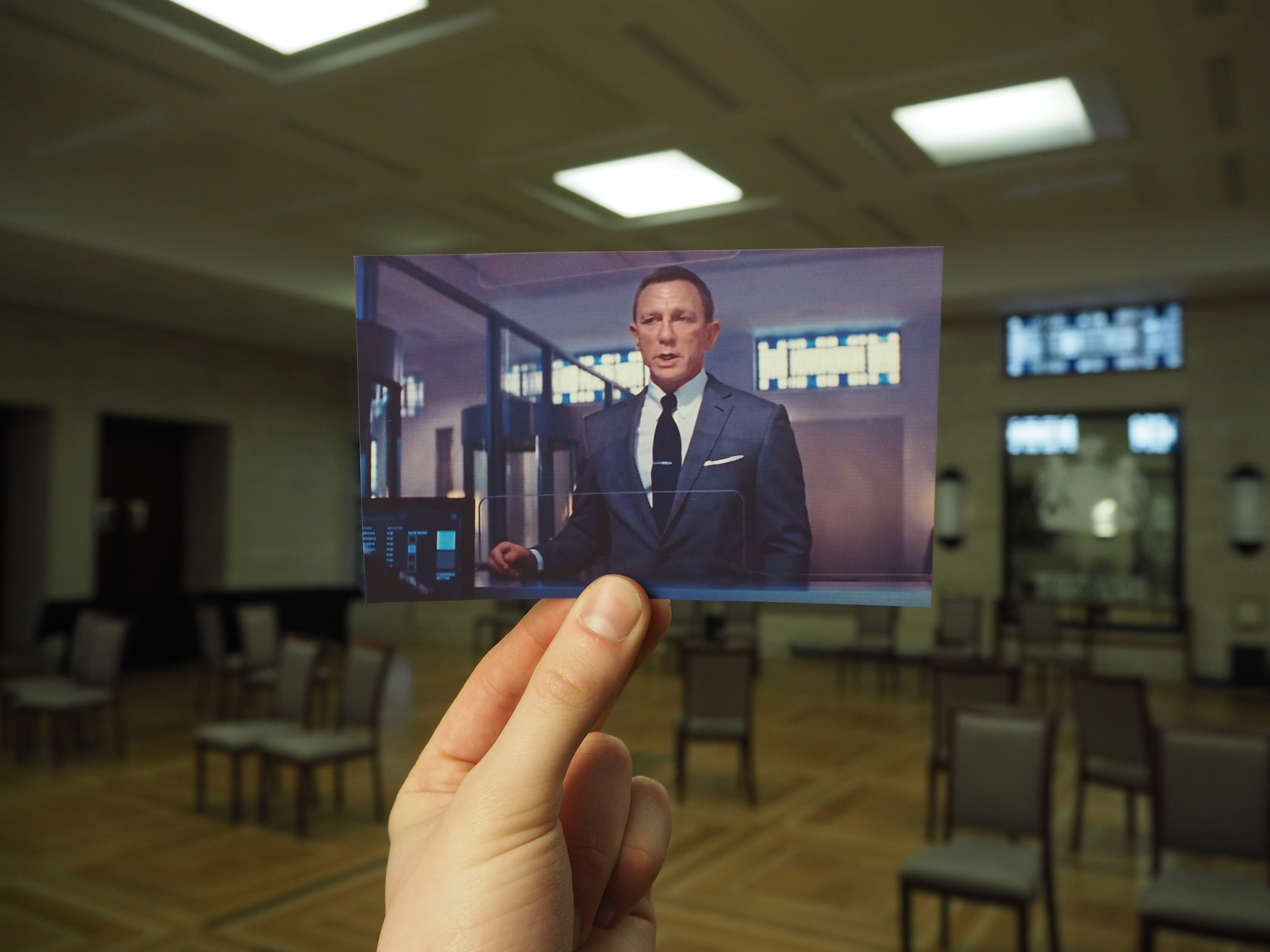 "Crush Hall setup with speaker image for engaging event presentation at University of London."