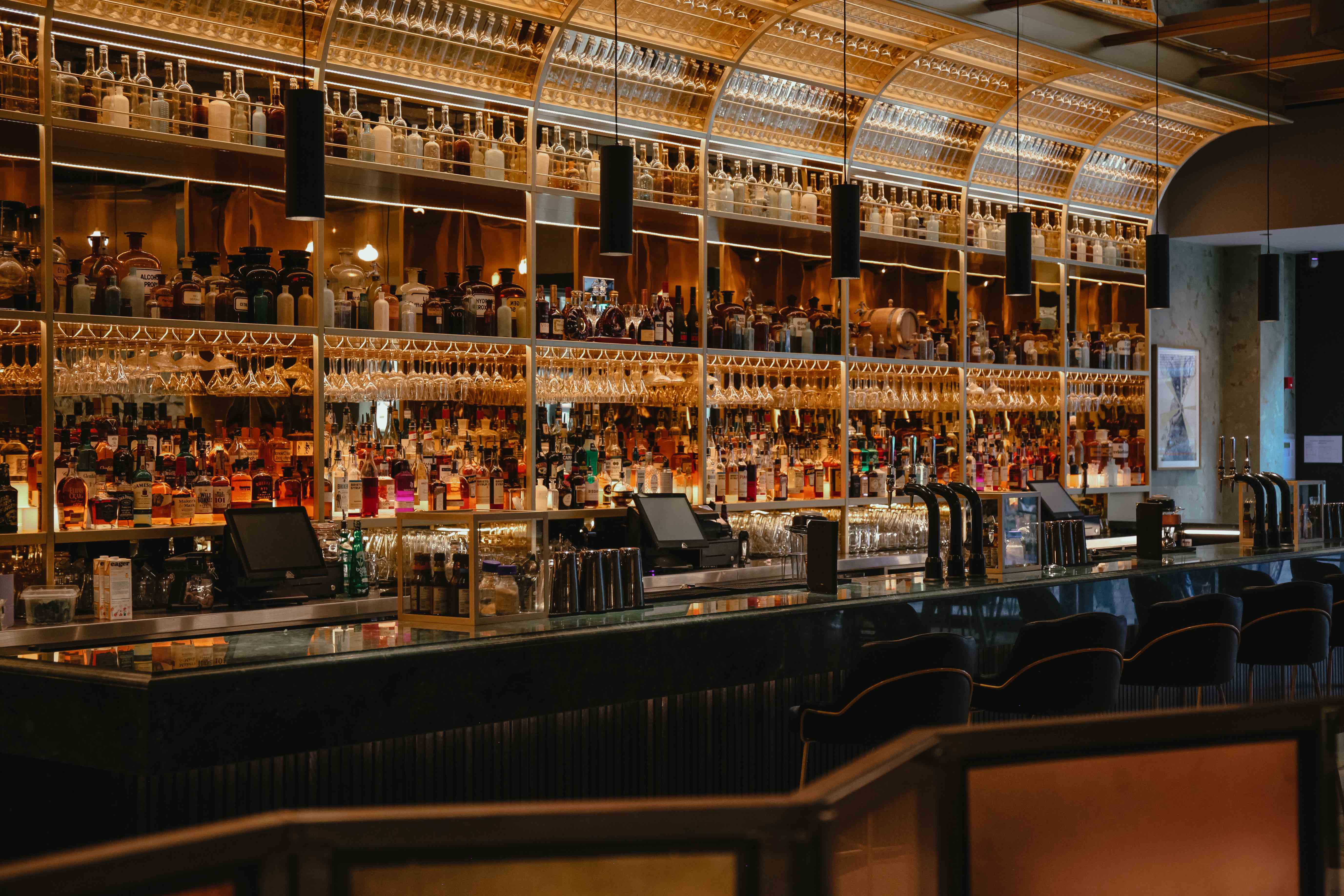 Stylish bar at The Alchemist Cheltenham, perfect for networking events and cocktail receptions.