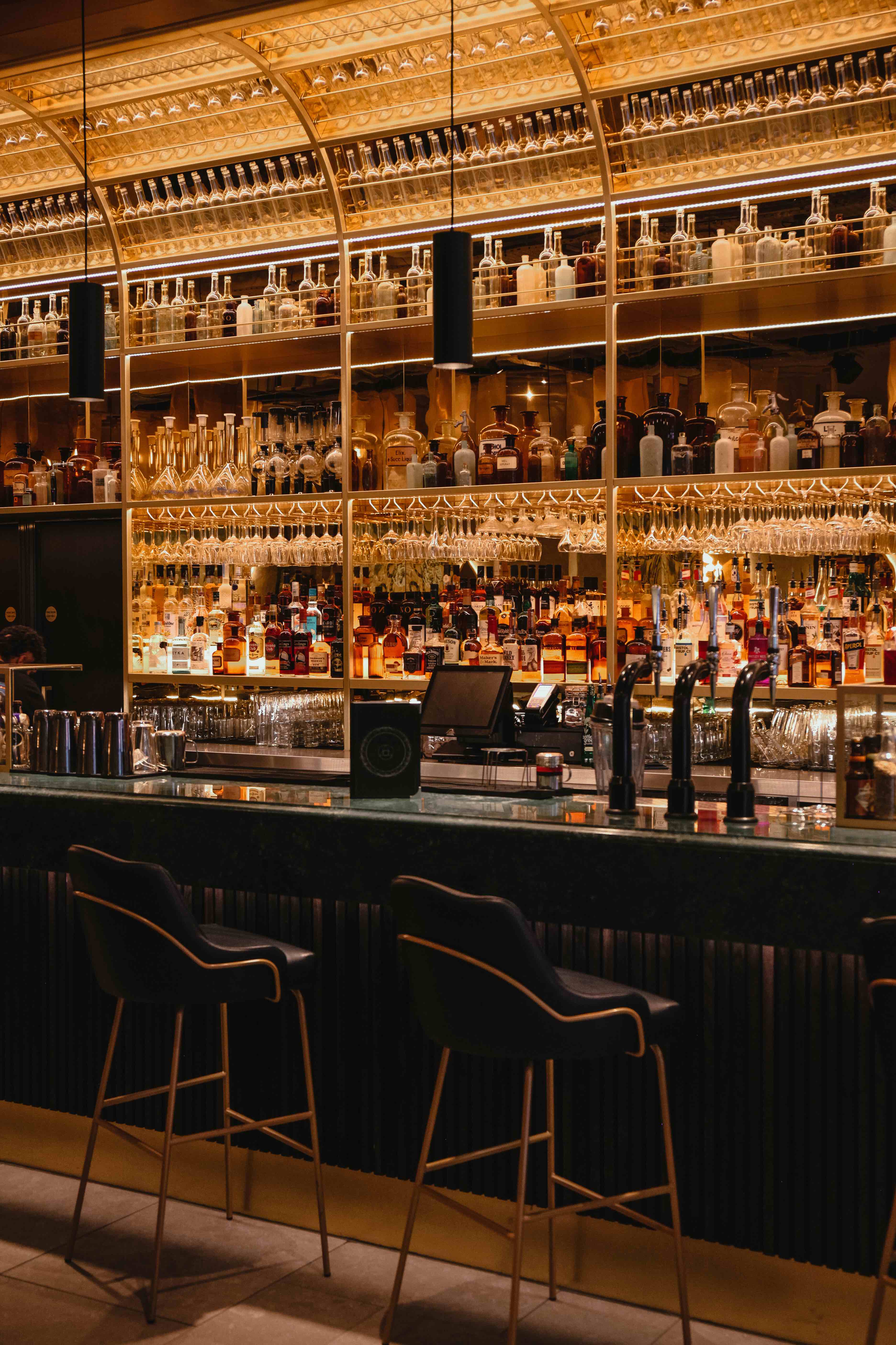 Elegant bar at The Alchemist Cheltenham, perfect for networking events and cocktail receptions.