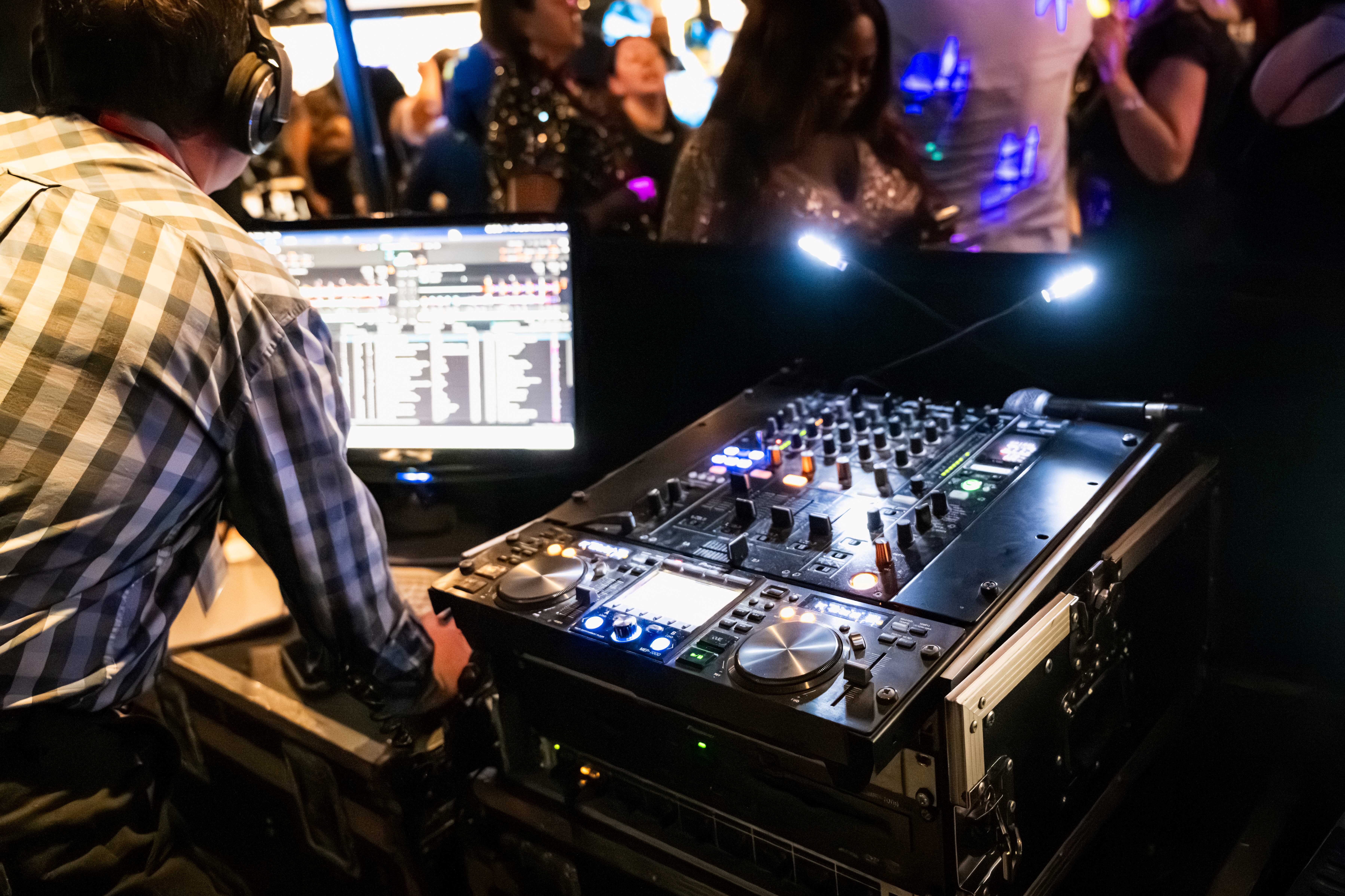 DJ setup at Allianz Stadium Christmas party, enhancing guest experience with audio-visuals.