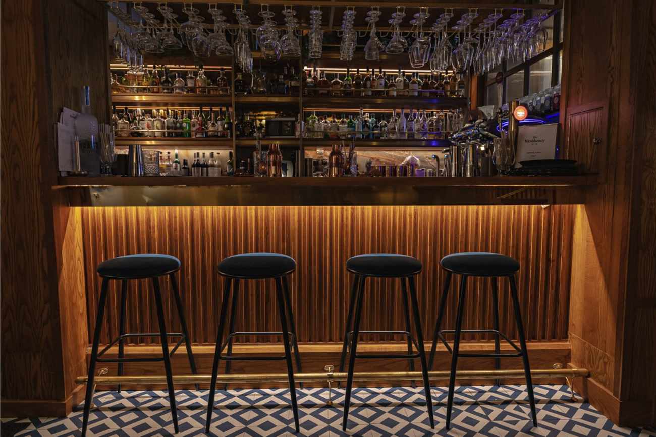 Stylish bar setup at The Residency, perfect for networking events and cocktail receptions.