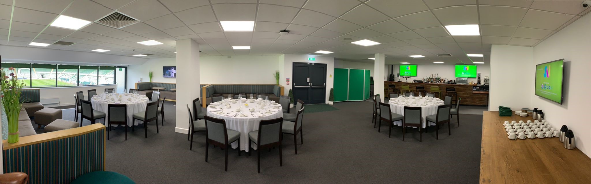 Players' Lounge at Home Park Stadium, elegant dining setup for events and networking.