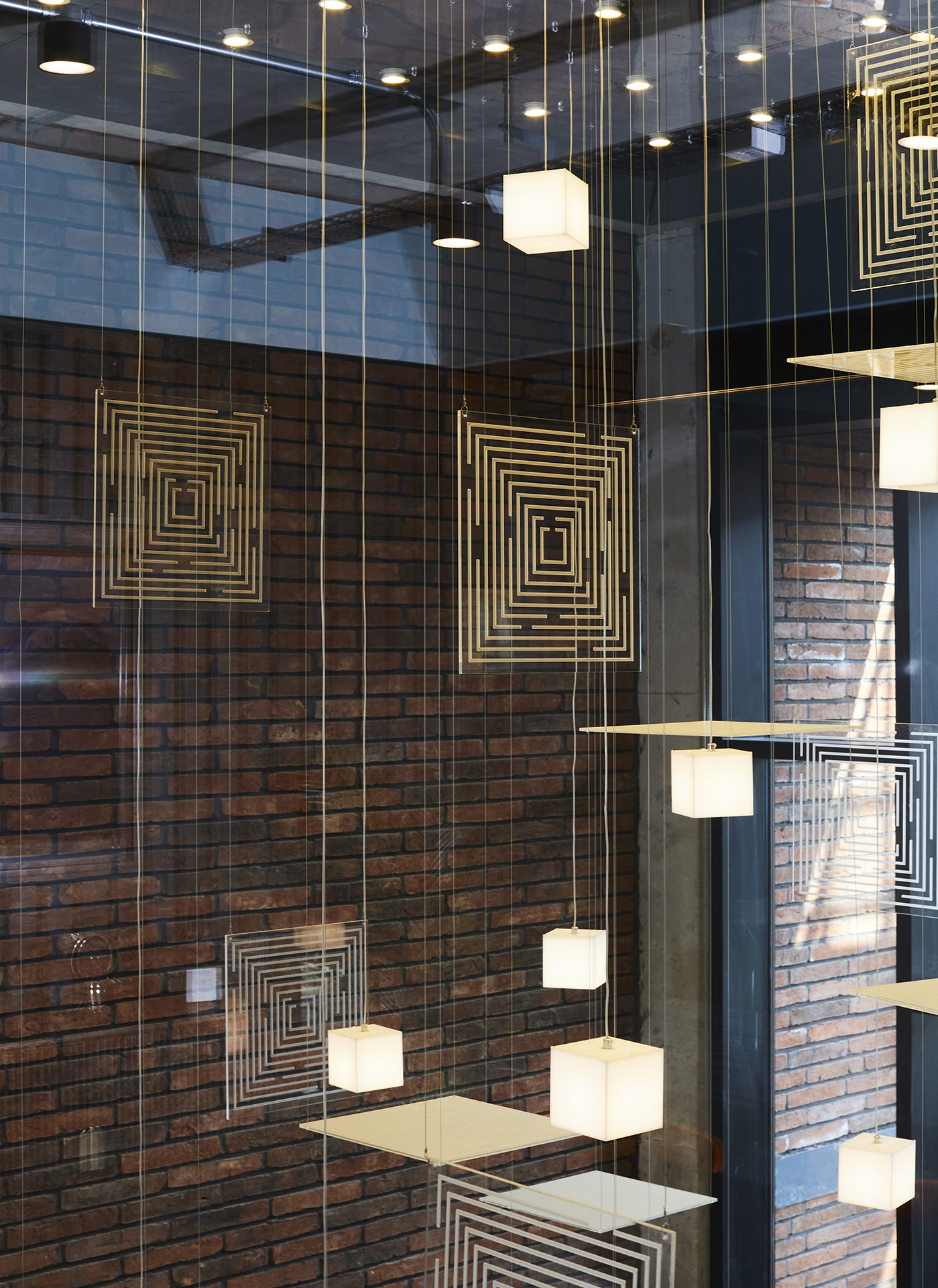 Modern event space with geometric patterns, ideal for networking and gatherings.