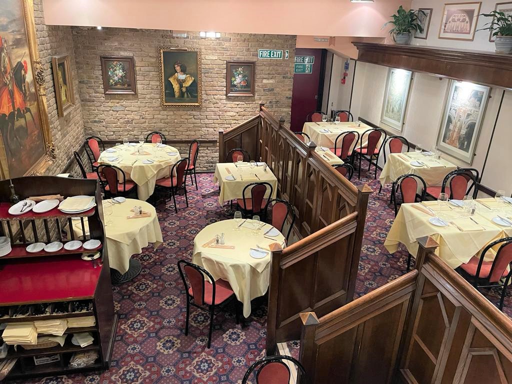 Exclusive Hire Bolton restaurant with round tables, ideal for intimate events and gatherings.