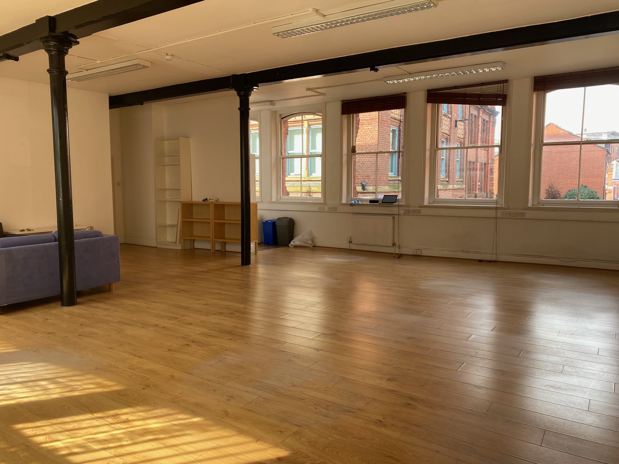 Spacious Tib Street Studio with large windows, perfect for workshops and gatherings.