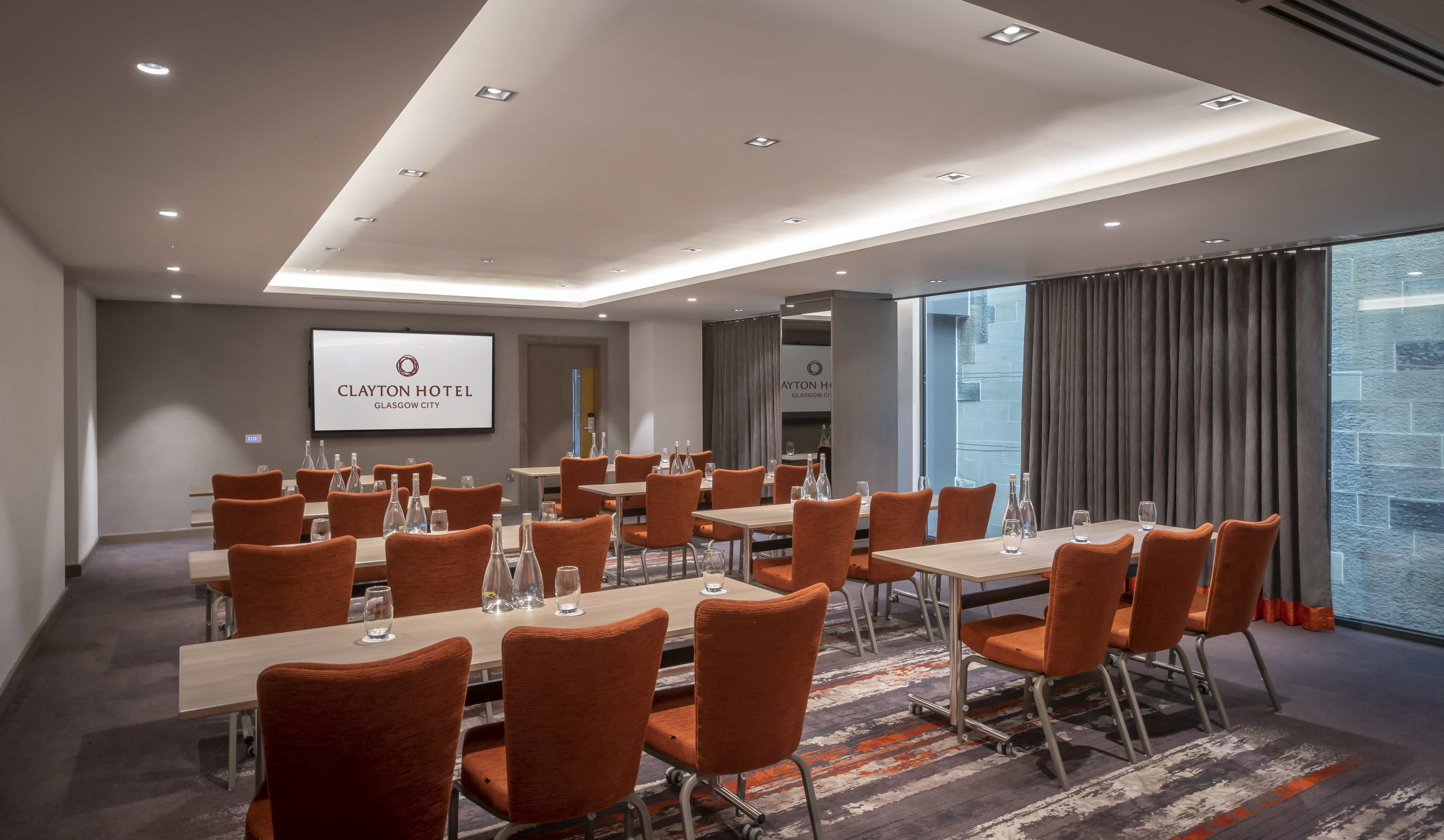 Modern meeting room at Custom House, Glasgow for corporate events and seminars.