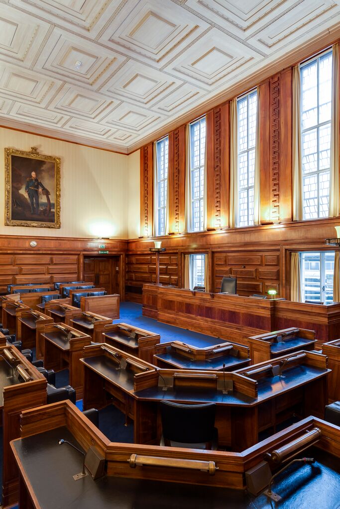 Senate Room at University of London, featuring wooden paneling for conferences and meetings.