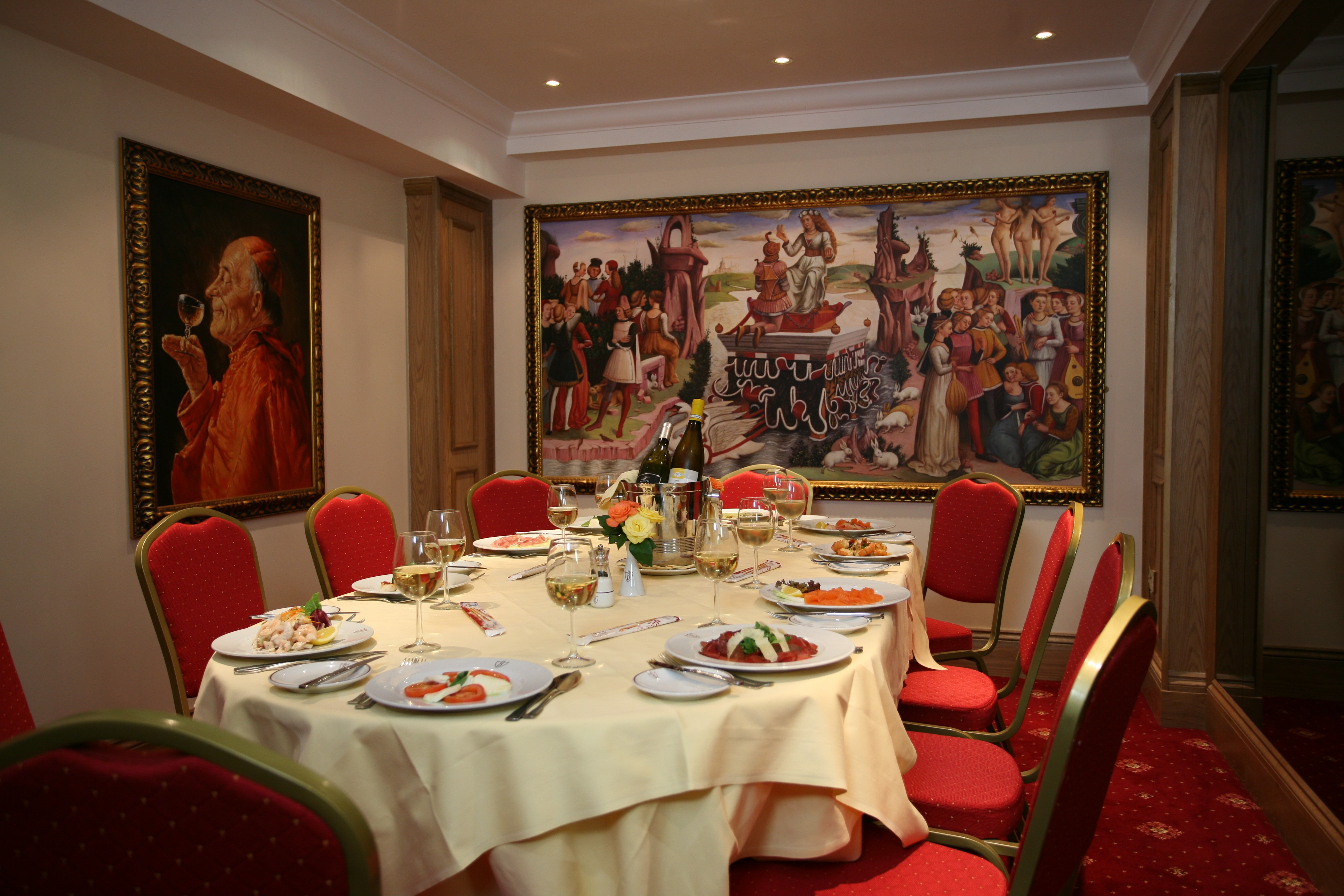 Elegant Venetian Room dining setup with fine linens for corporate events in Bolton's Restaurant.