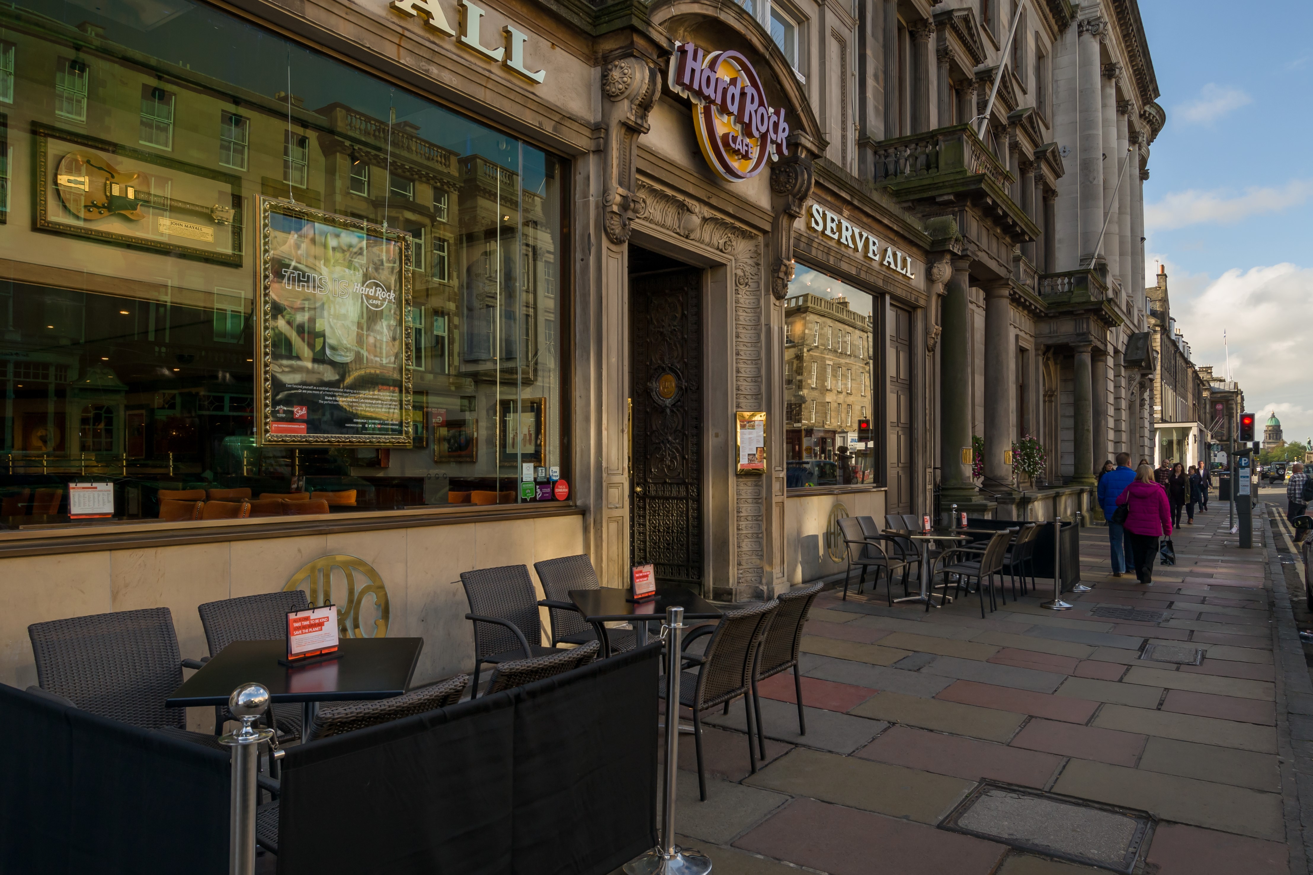 Vibrant outdoor seating at Hard Rock Cafe Edinburgh for casual networking events.