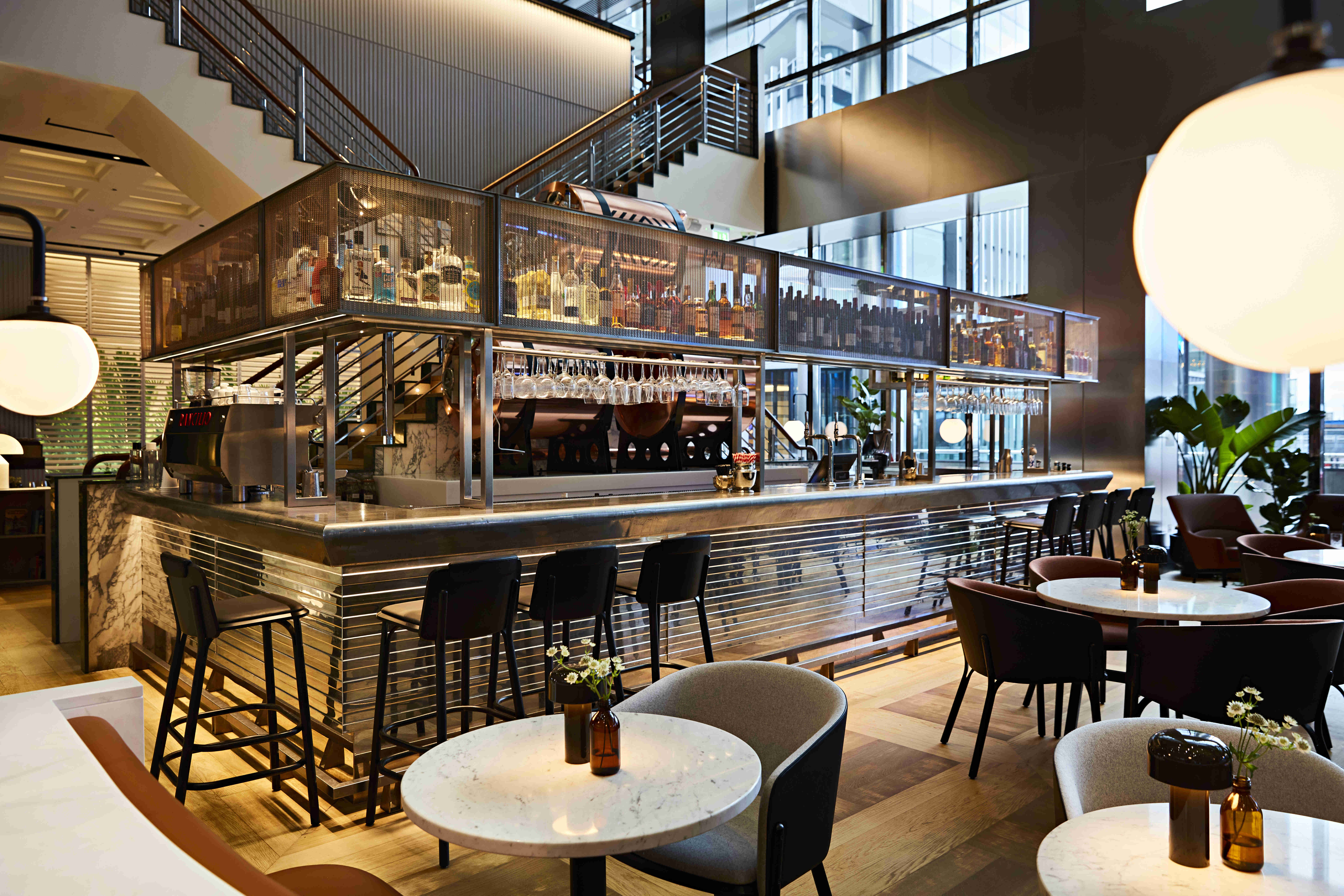Modern bar area at Shutters, Canary Wharf, ideal for networking events and gatherings.