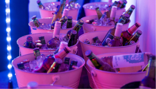 Vibrant ice-filled buckets of beverages for Christmas event at M Shed.