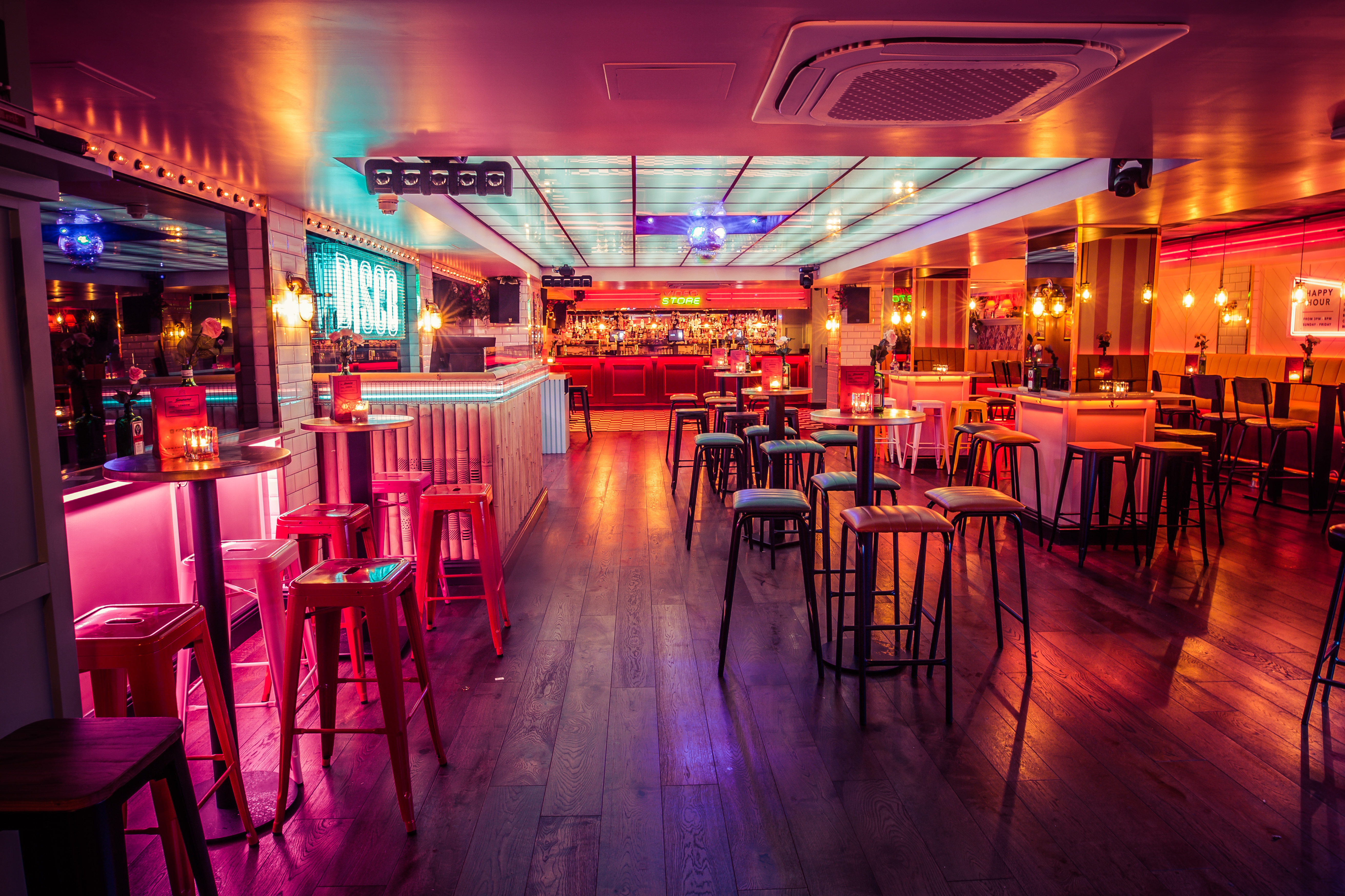 Vibrant event space with modern decor for networking and social gatherings in Leicester Square.