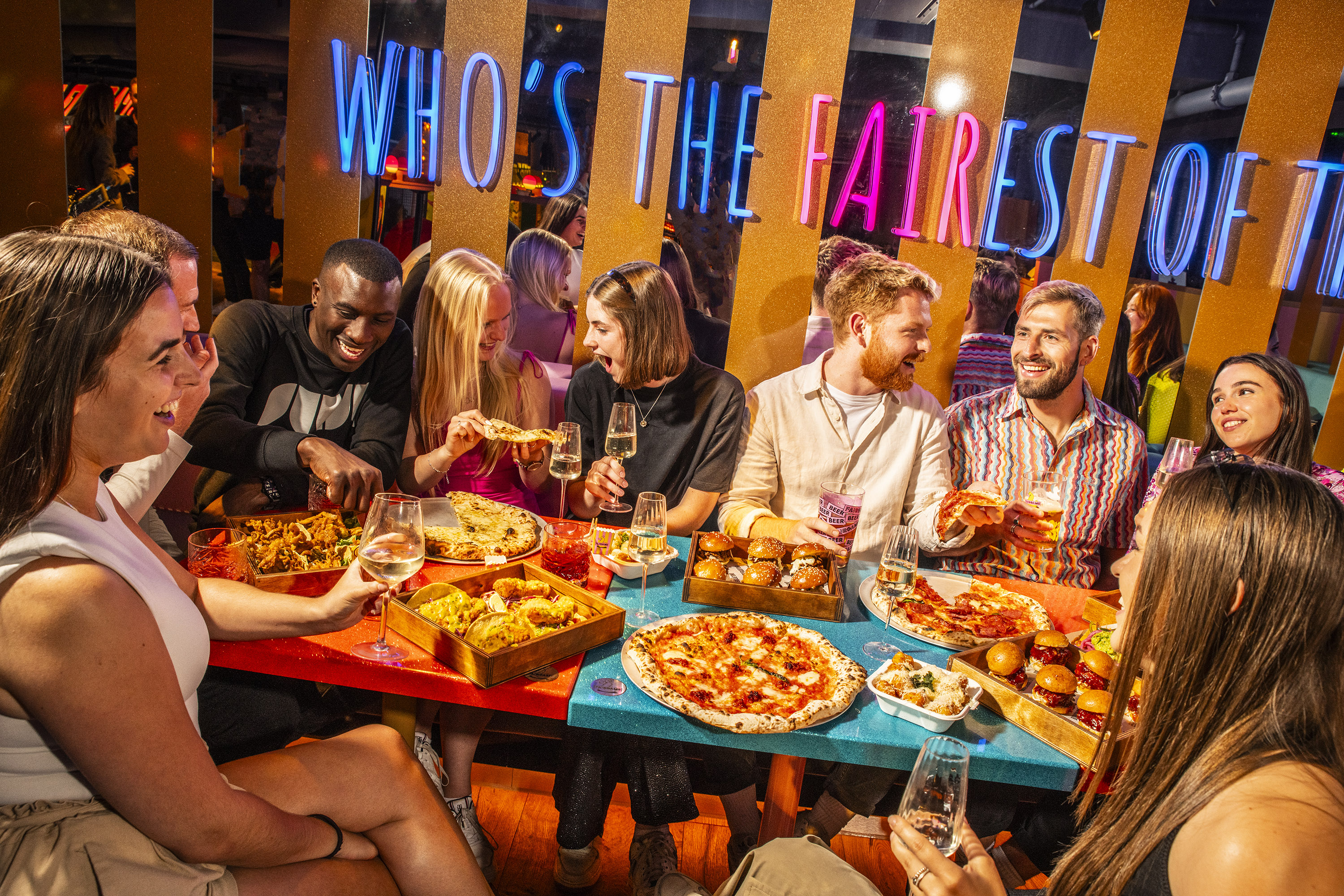 Big Top Mezzanine dining scene, vibrant guests enjoying networking and social events.