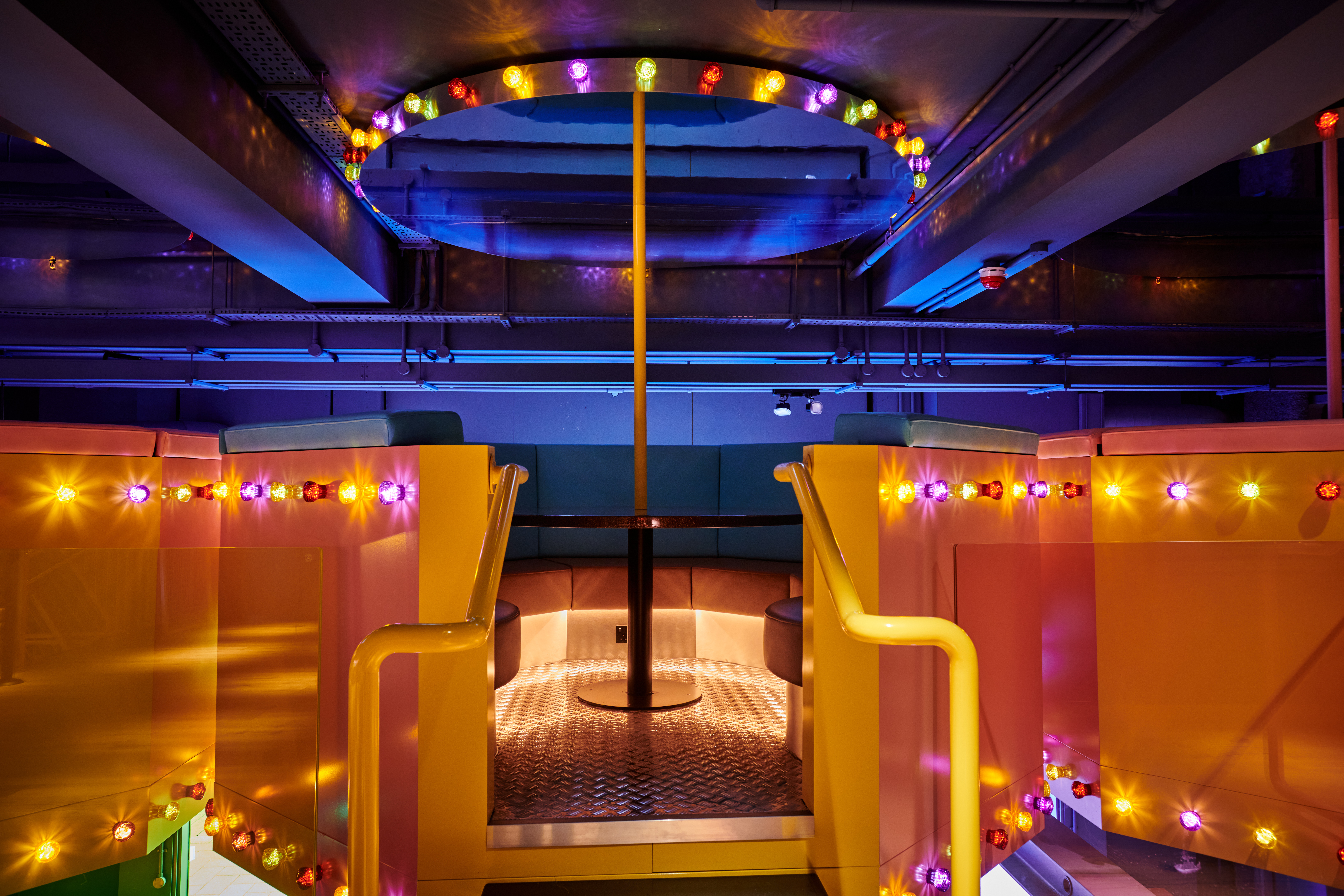 Big Top Mezzanine event space with colorful lighting for themed parties and corporate events.