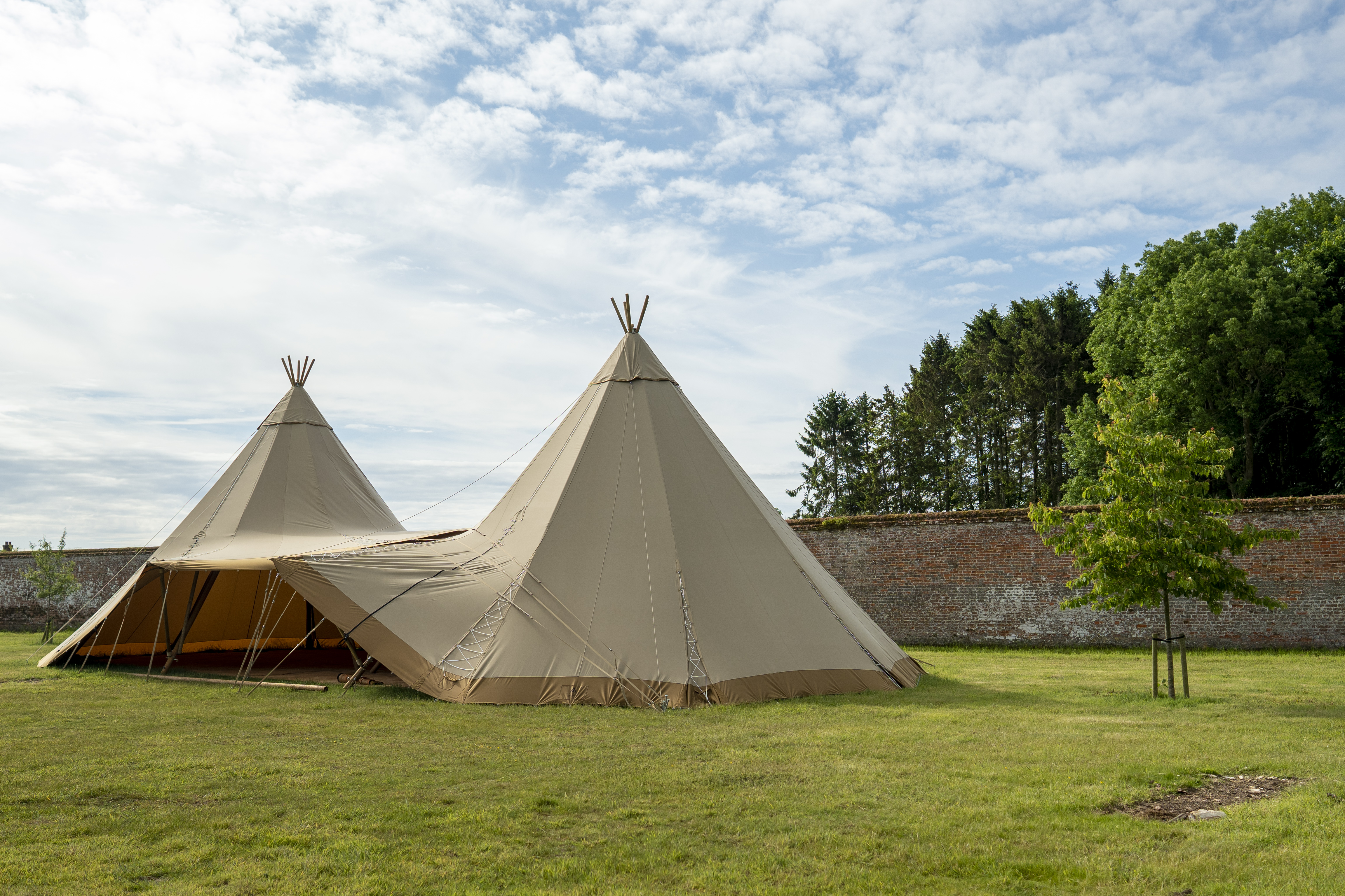 Walled Garden Raynham with tipis, perfect for weddings and outdoor events.