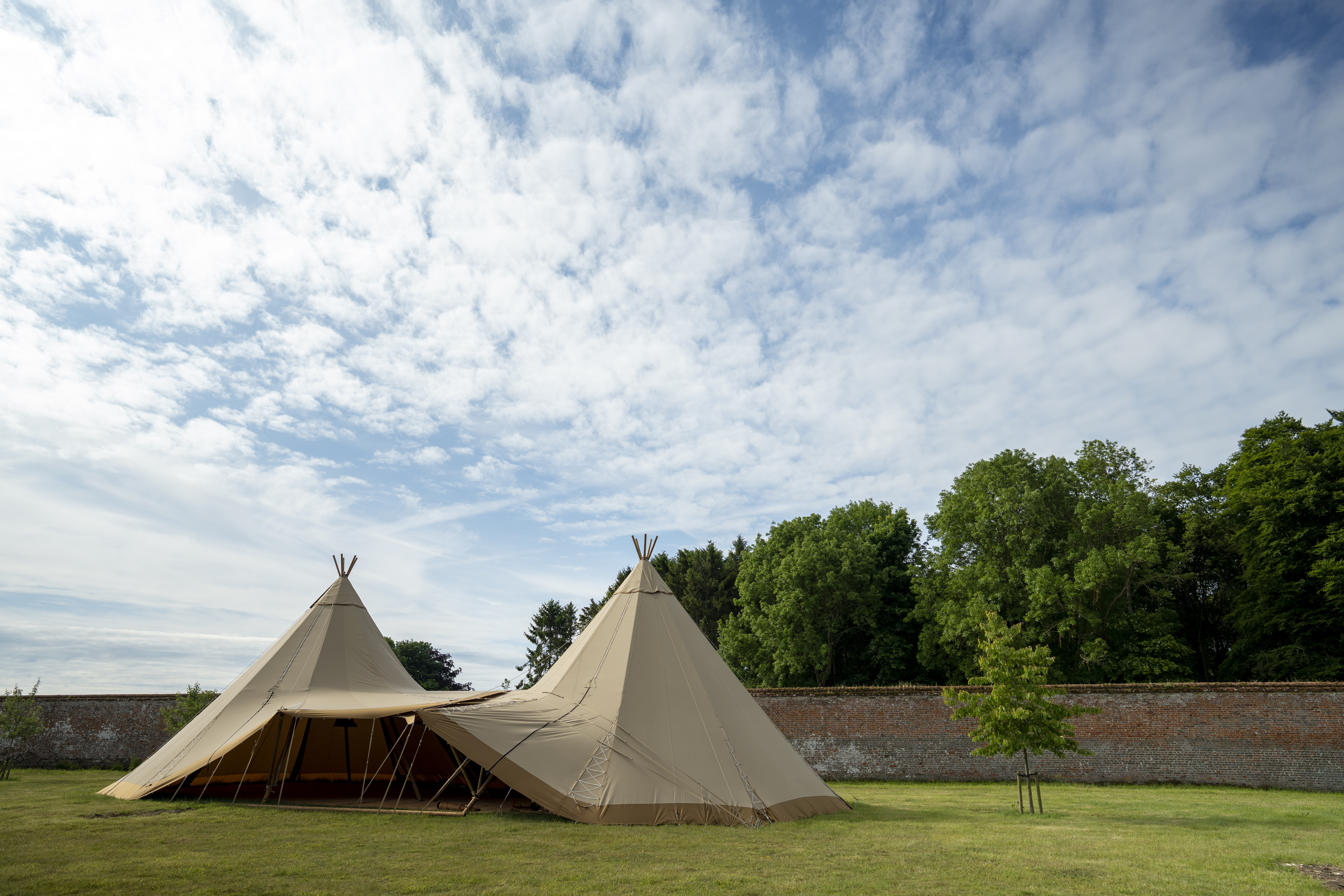 Teepee event tent in The Walled Garden, Raynham, perfect for outdoor gatherings.