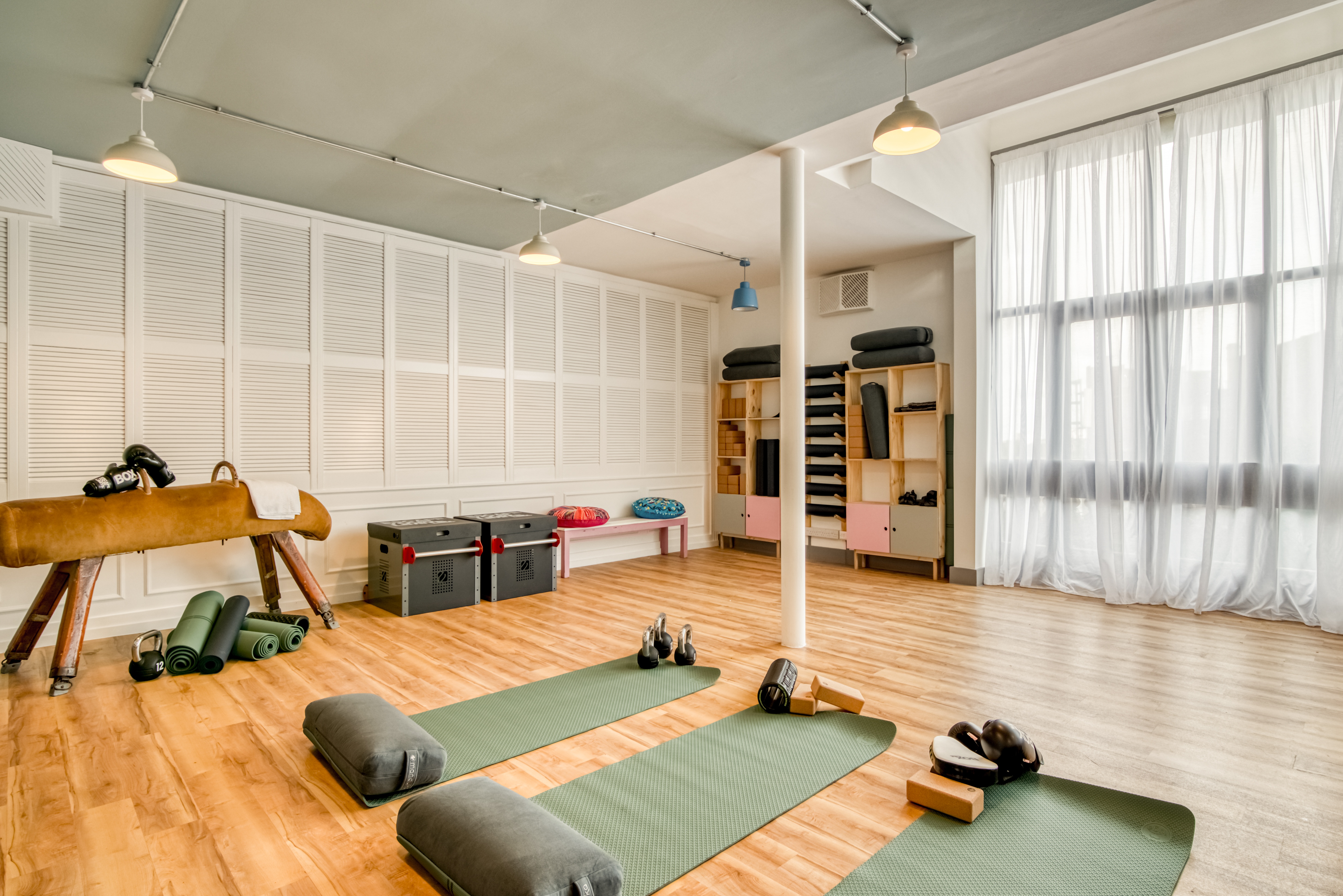 Wellness Room in Birmingham Selina, bright space for yoga classes and retreats.