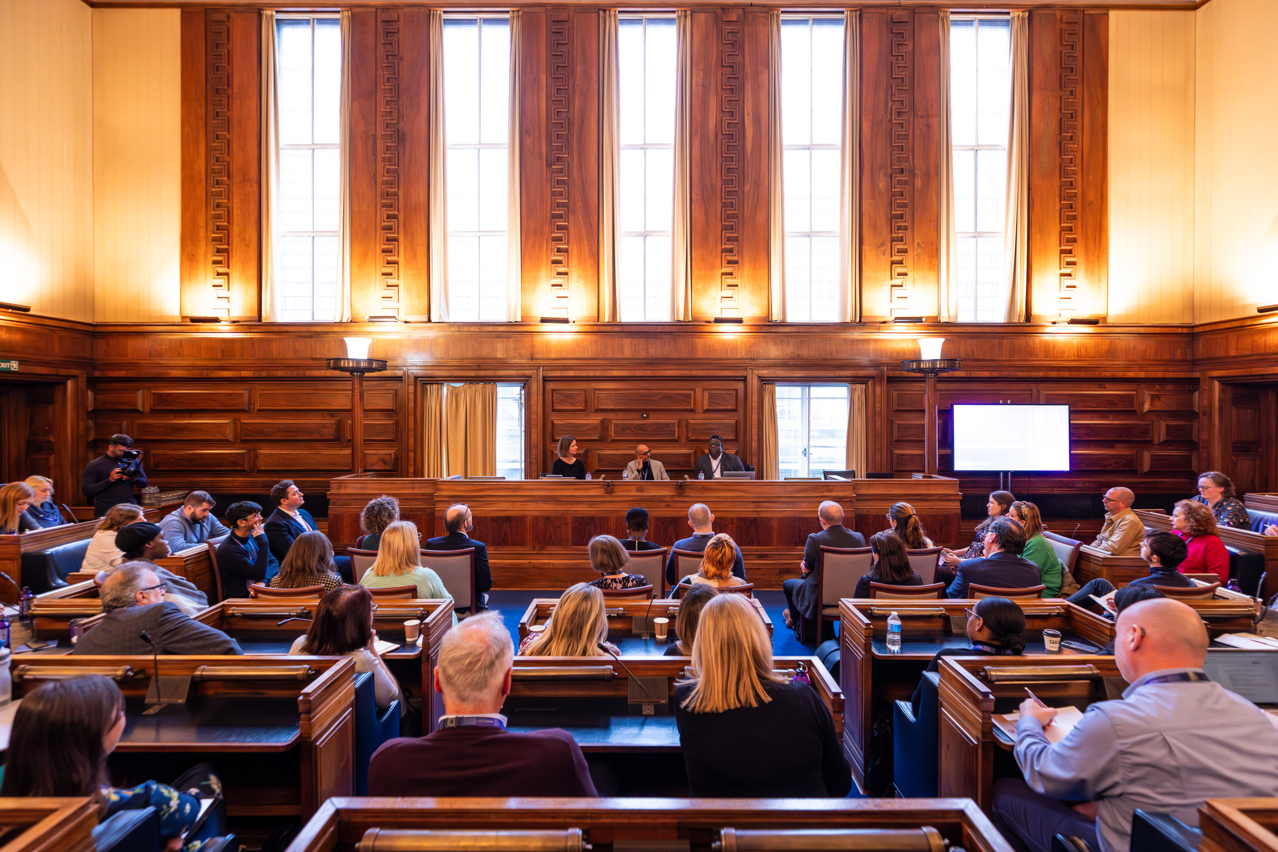 Senate Room at University of London, elegant panel setup for engaging discussions.